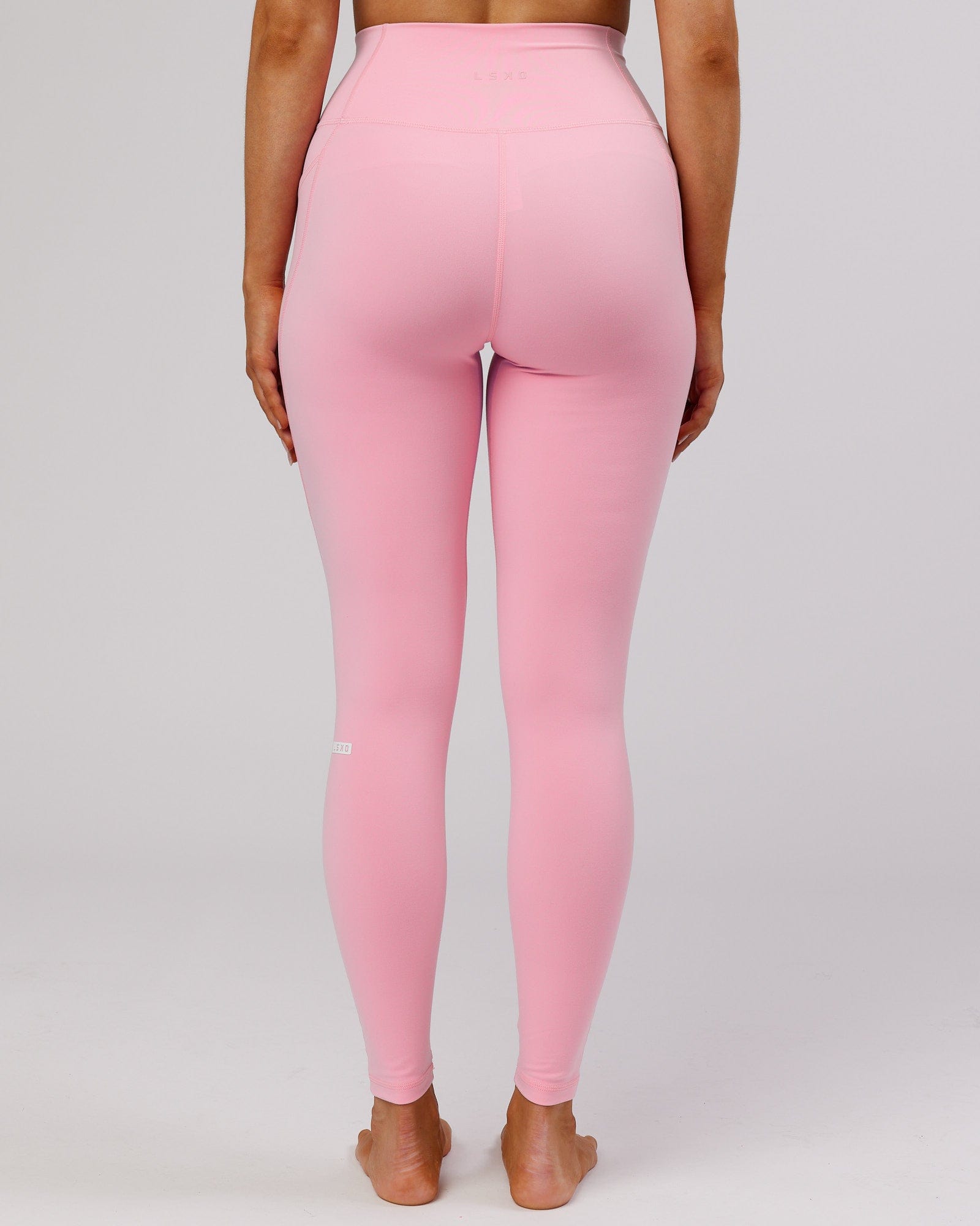 Model wearing Fusion Full Length Tight - Pink Frosting