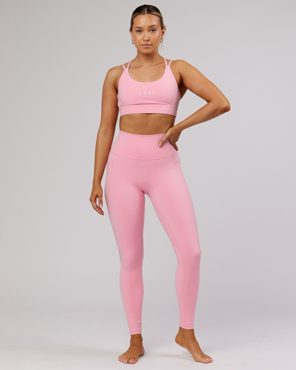 Model wearing Fusion Full Length Tight - Pink Frosting