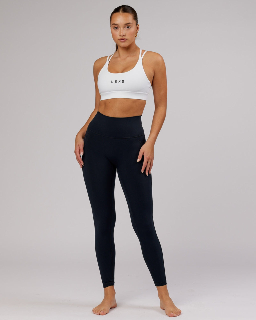 Model wearing Fusion Full Length Tight - Navy