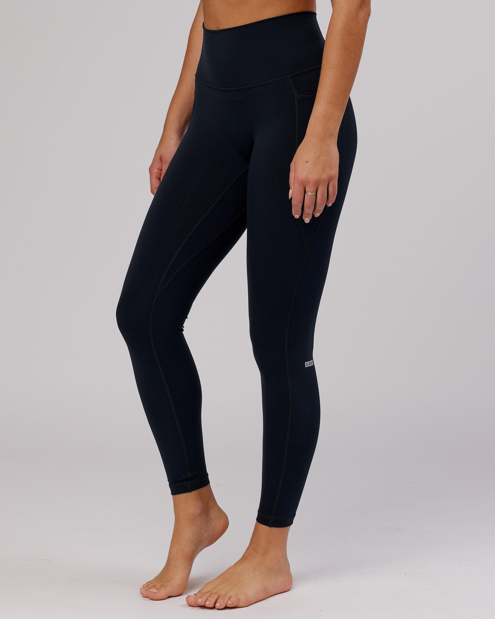 Model wearing Fusion Full Length Tight - Navy