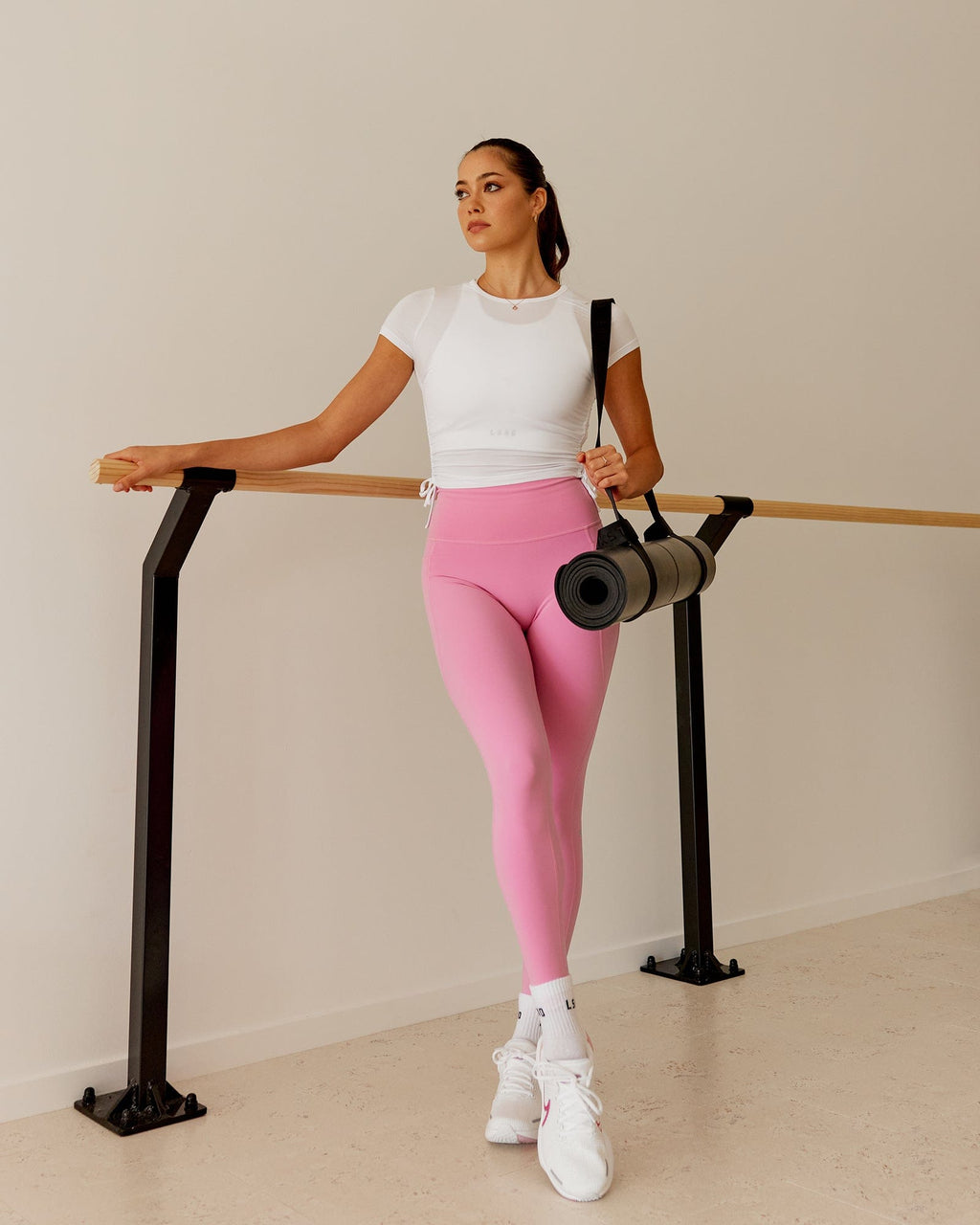 Model wearing Fusion Full Length Tight - Spark Pink