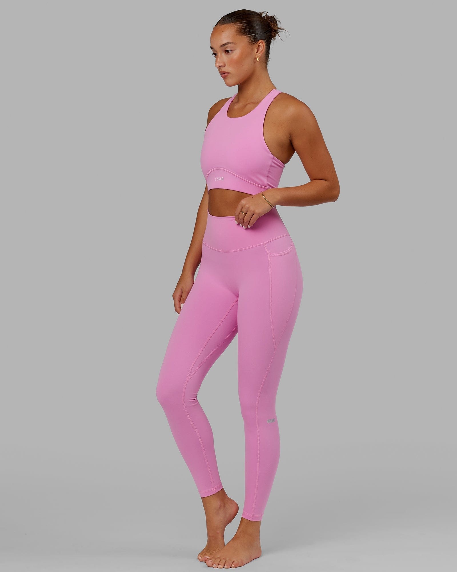 Model wearing Fusion Full Length Tight - Spark Pink