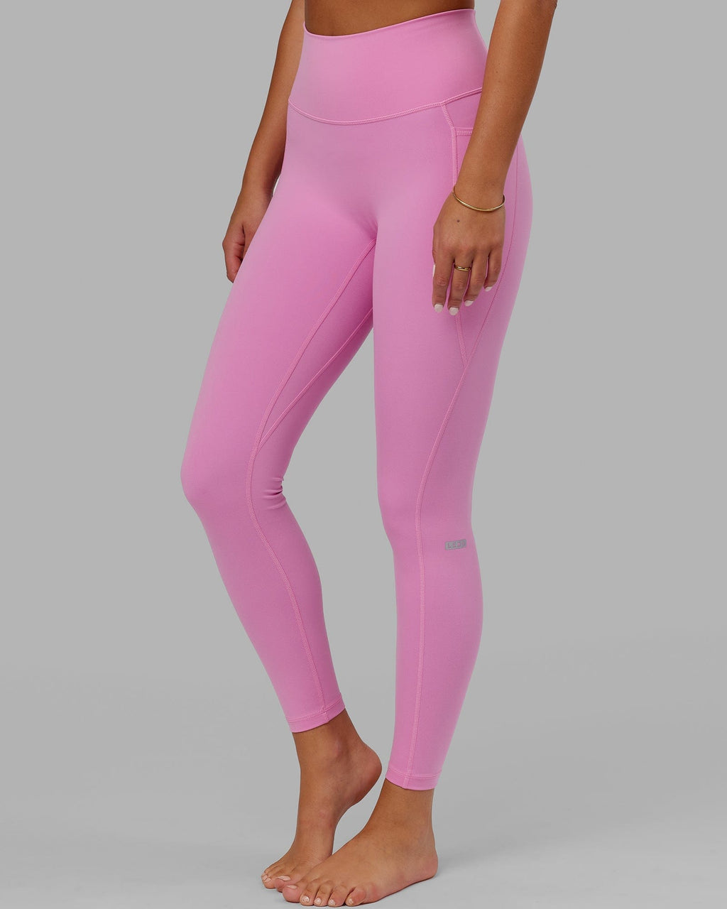 Model wearing Fusion Full Length Tight - Spark Pink