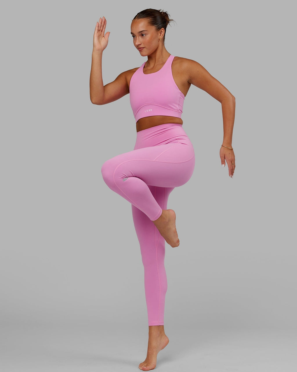 Model wearing Fusion Full Length Tight - Spark Pink