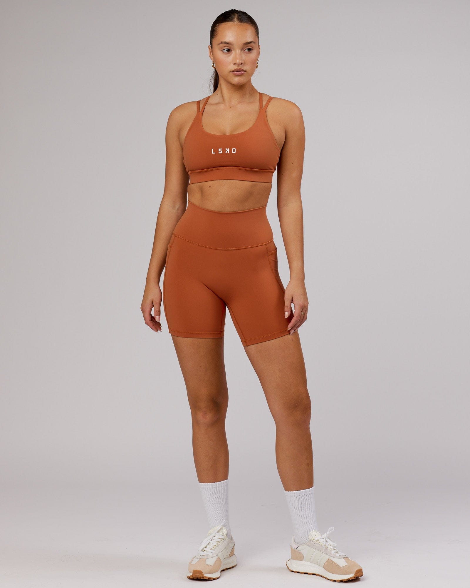 Model wearing Fusion Mid Short Tight - Auburn