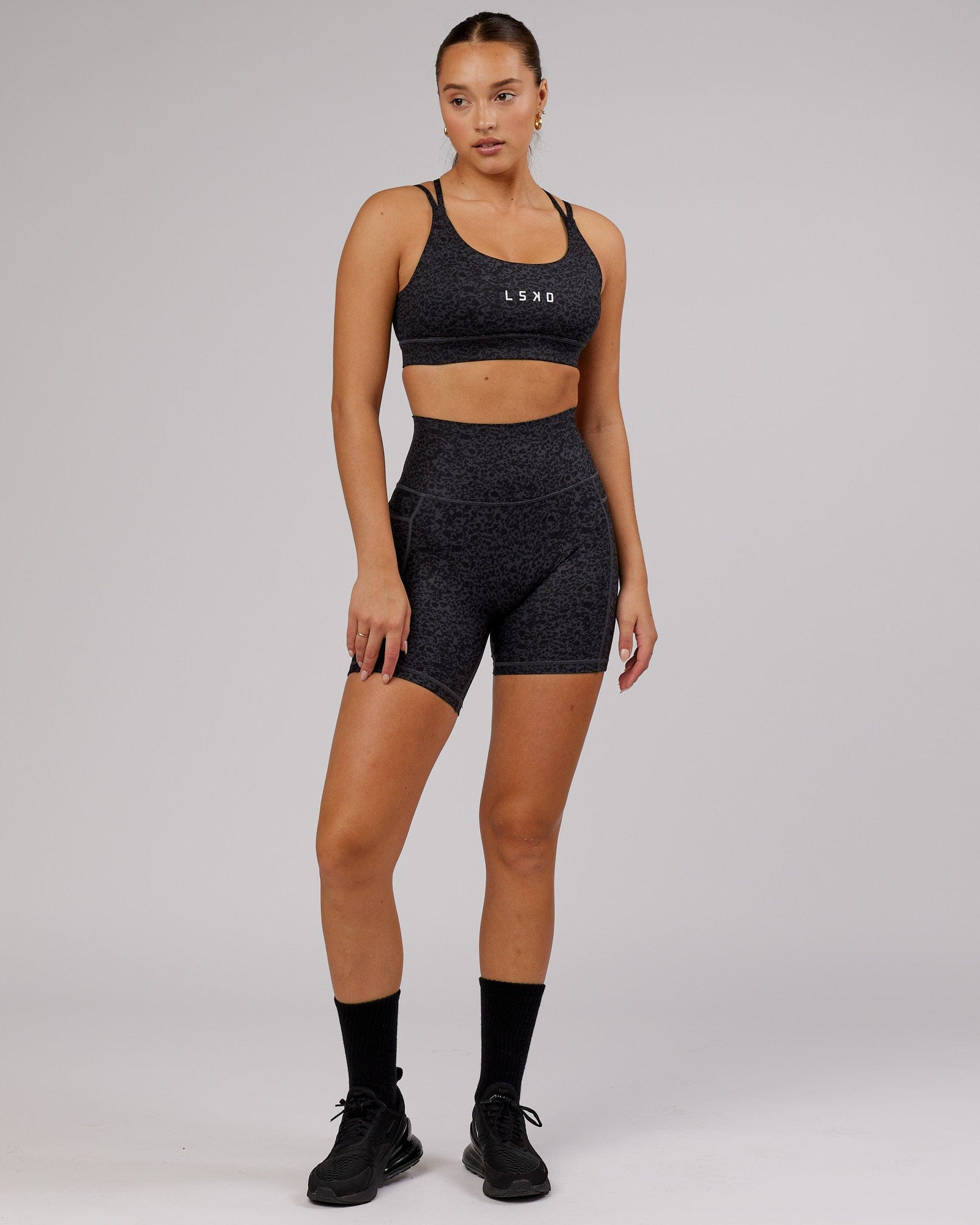 Model wearing Fusion Mid Short Tight - Black Etching