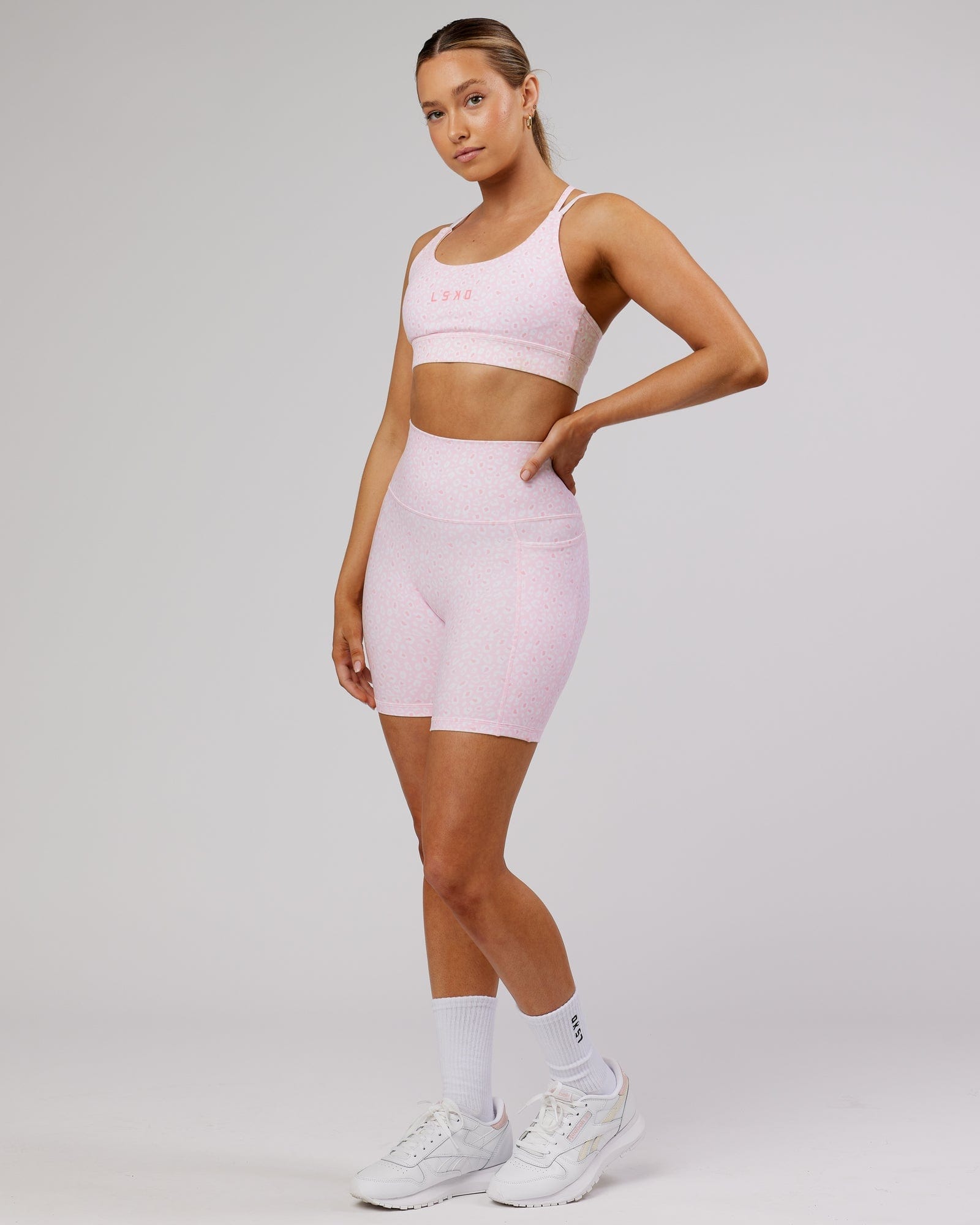 Model wearing Fusion Mid Short Tight - Blush Leopard