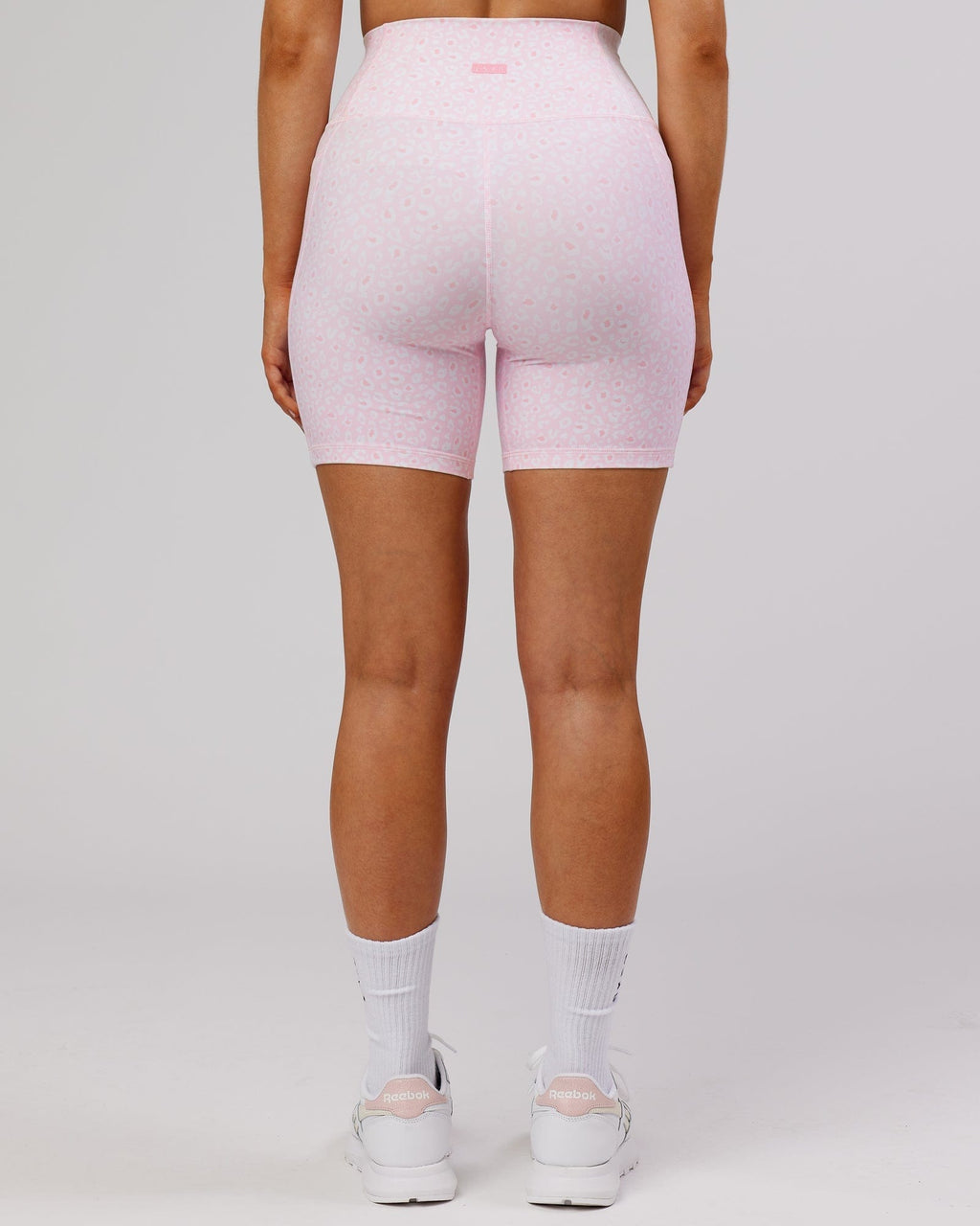 Model wearing Fusion Mid Short Tight - Blush Leopard