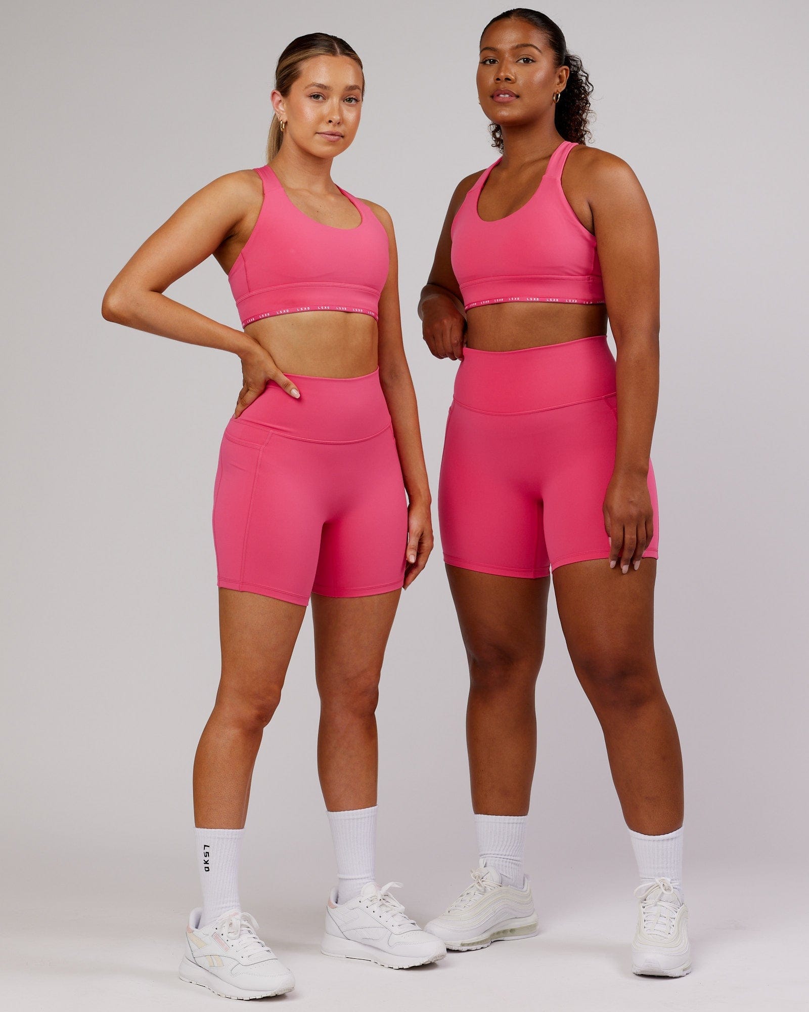 Model wearing Fusion Mid-Short Tight - Flamingo