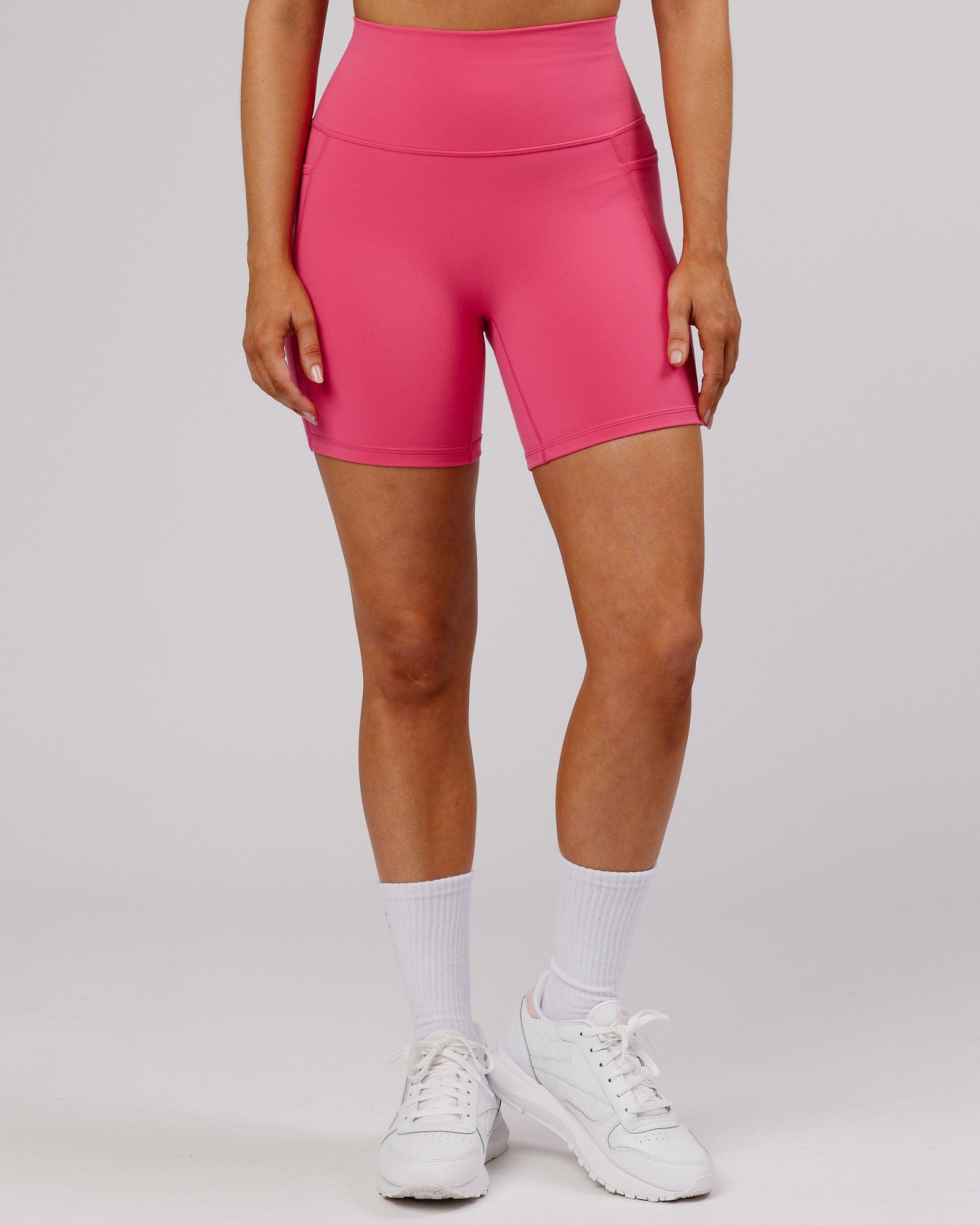 Model wearing Fusion Mid-Short Tight - Flamingo