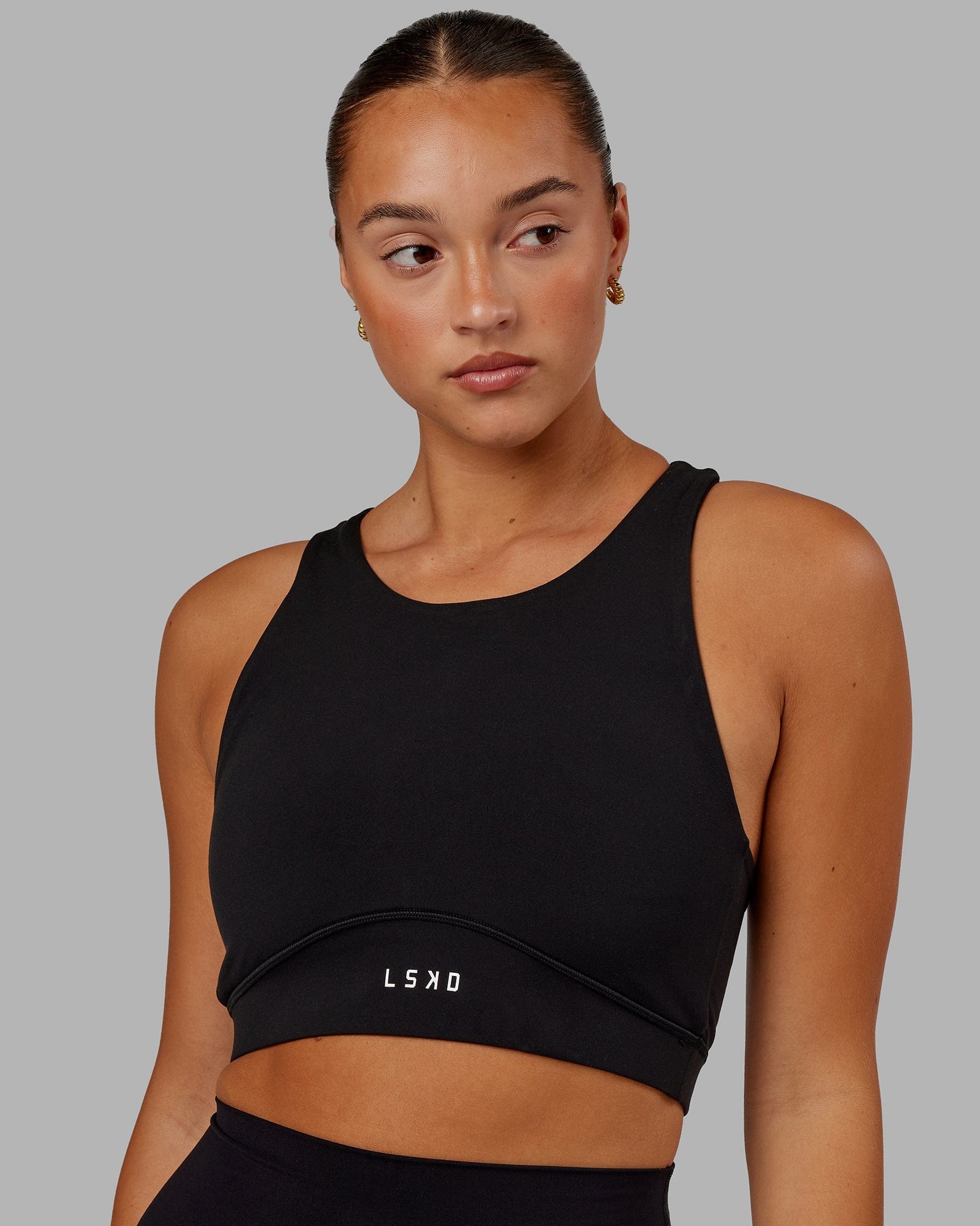 Model wearing Fusion Sports Bra - Black
