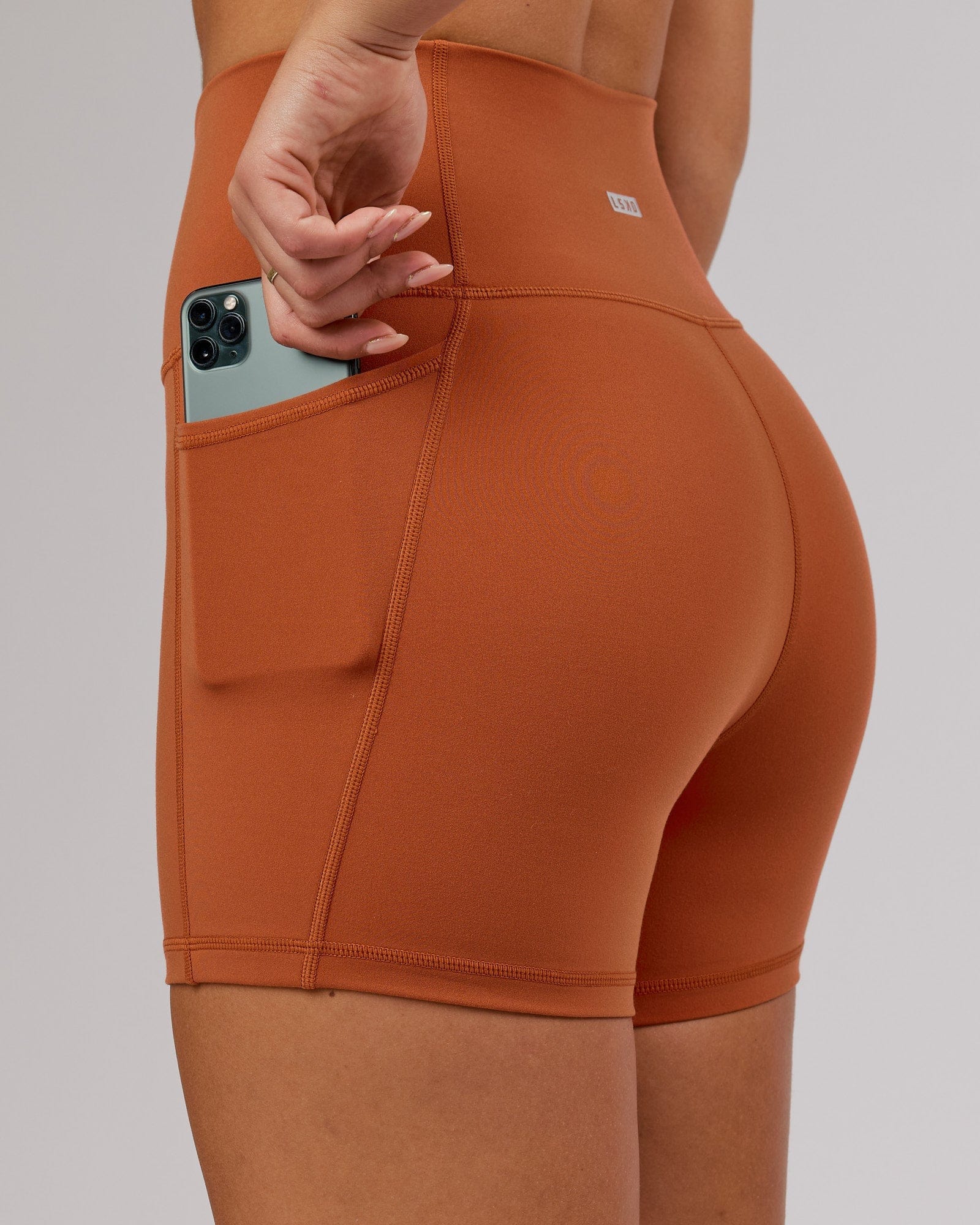 Model wearing Fusion X-Short Tight - Auburn