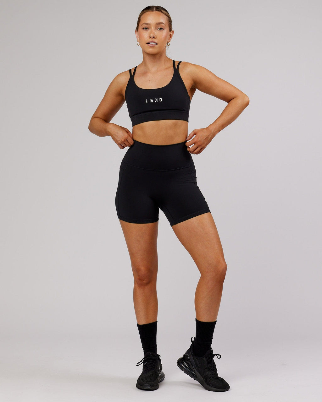 Model wearing Fusion X-Short Tight - Black-Flamingo