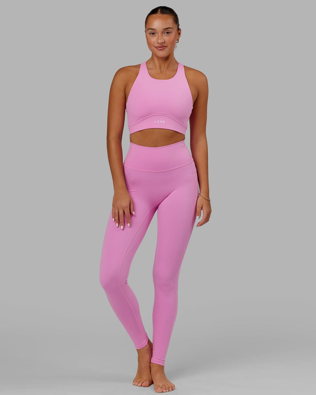 Model wearing Fusion X-long Tight - Spark Pink