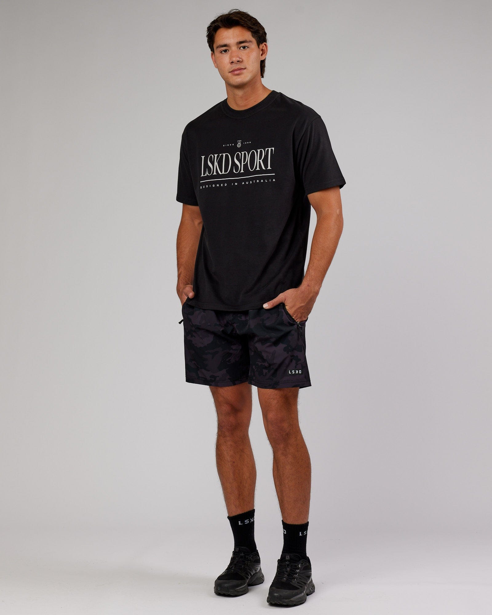 Model wearing Unisex Heritage Heavyweight Tee Oversize - Black-Beige