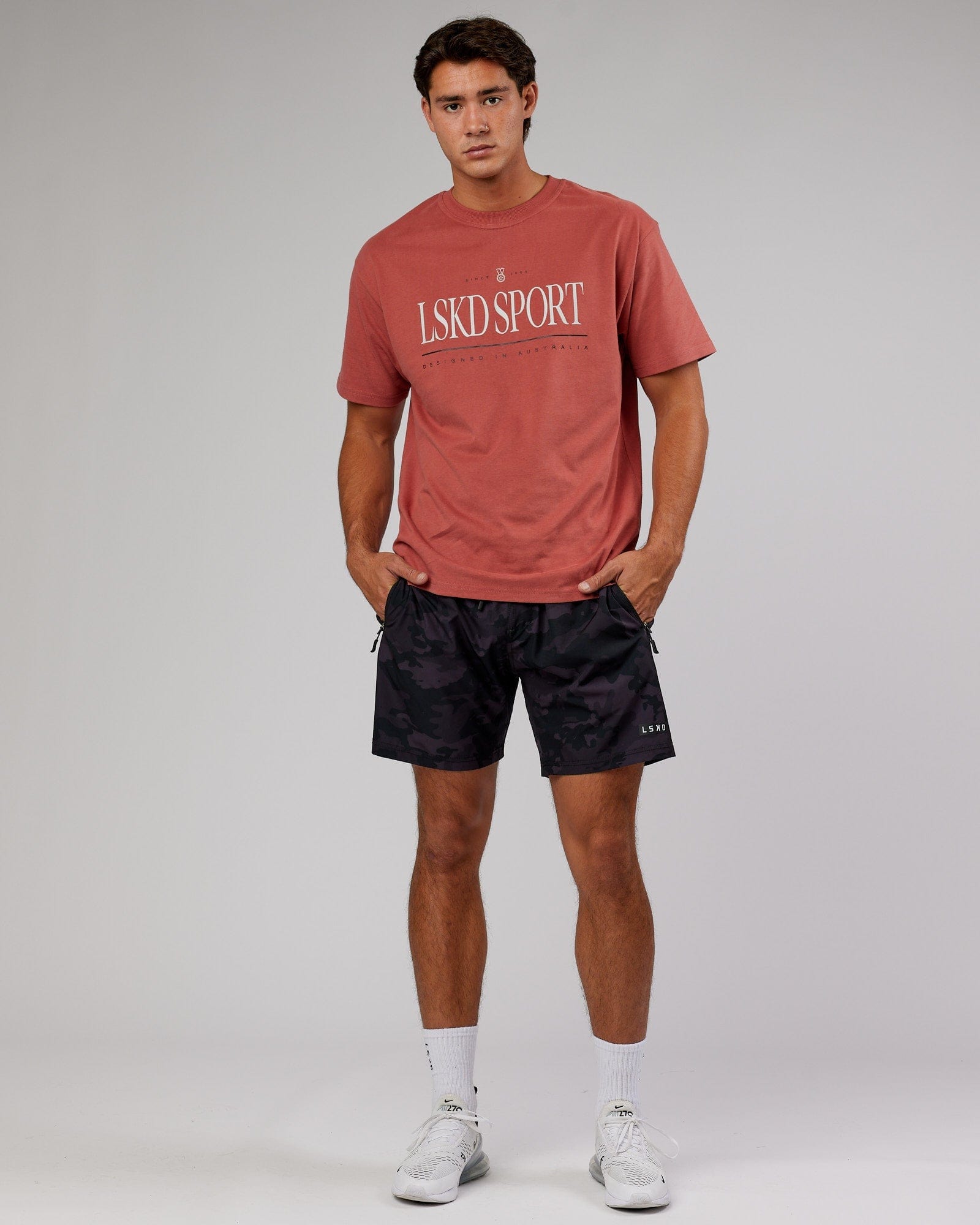 Model wearing Unisex Heritage Heavyweight Tee Oversize - Marsala