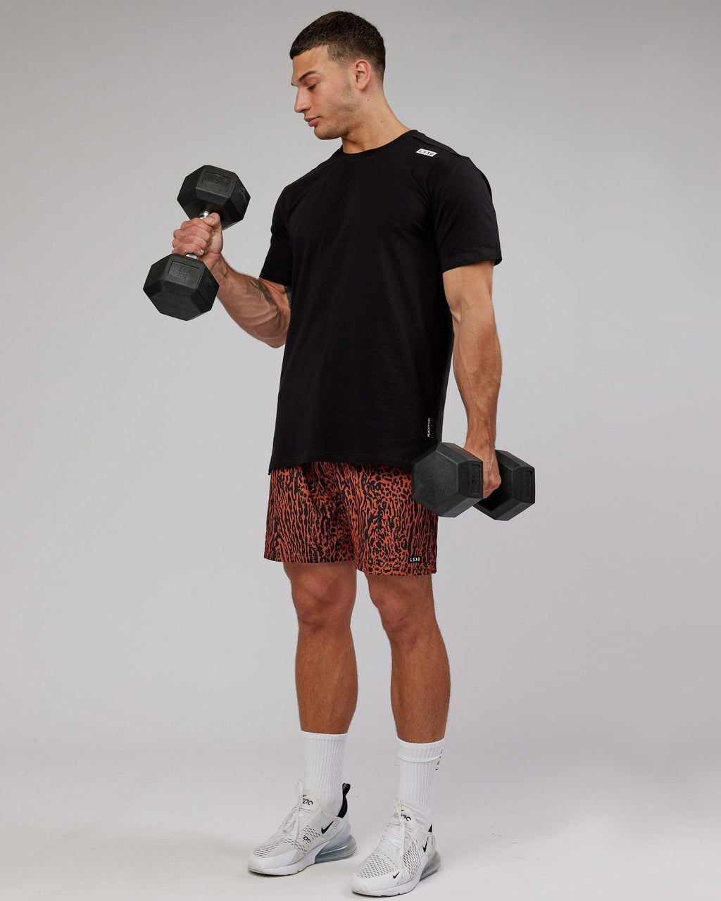 Model wearing Hunter 7" Performance Short - Auburn Black