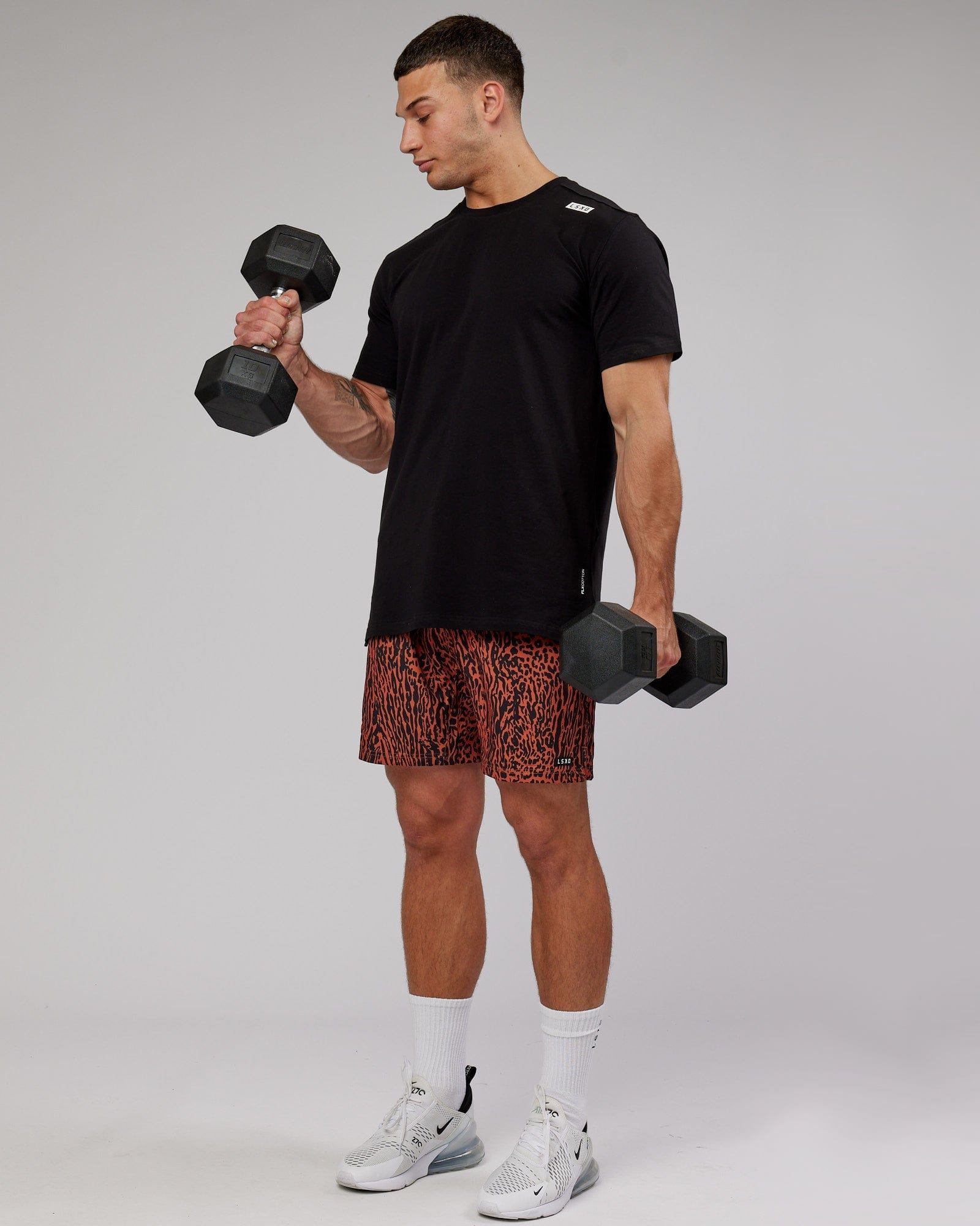 Model wearing Hunter 7" Performance Short - Auburn Black