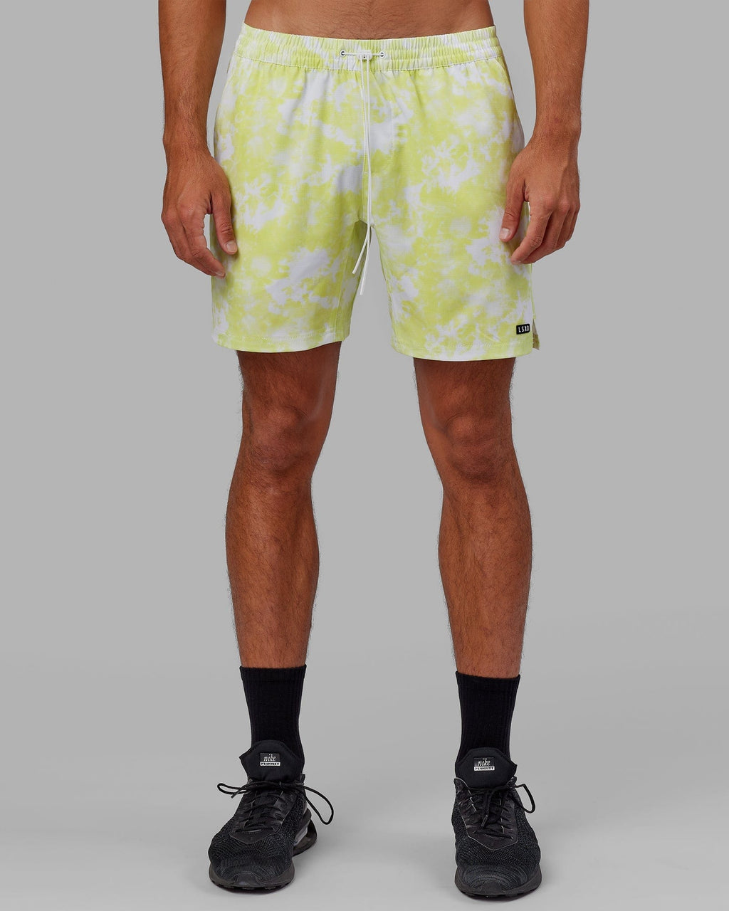 Model wearing Hunter 7" Performance Short - Citrus Green