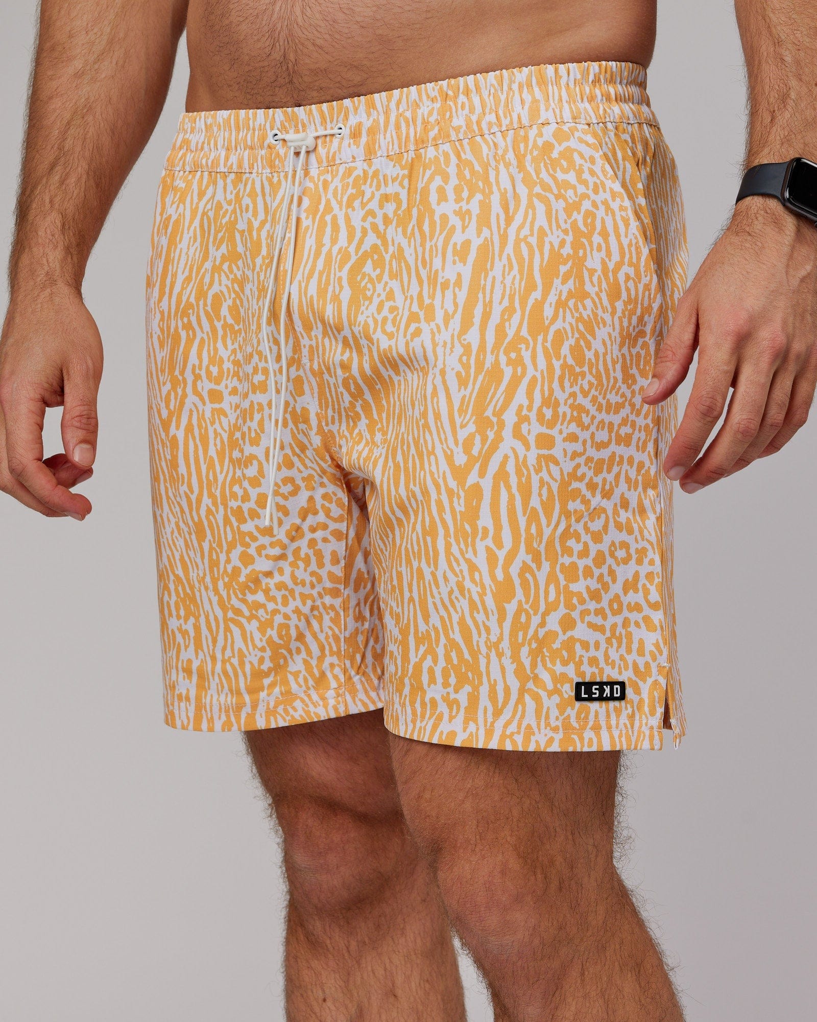 Model wearing Hunter 7" Performance Short - Warm Apricot
