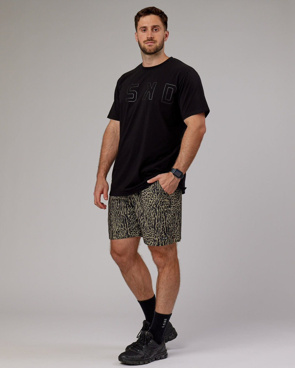 Model wearing Hunter 7" Performance Short - Laurel Oak-Black