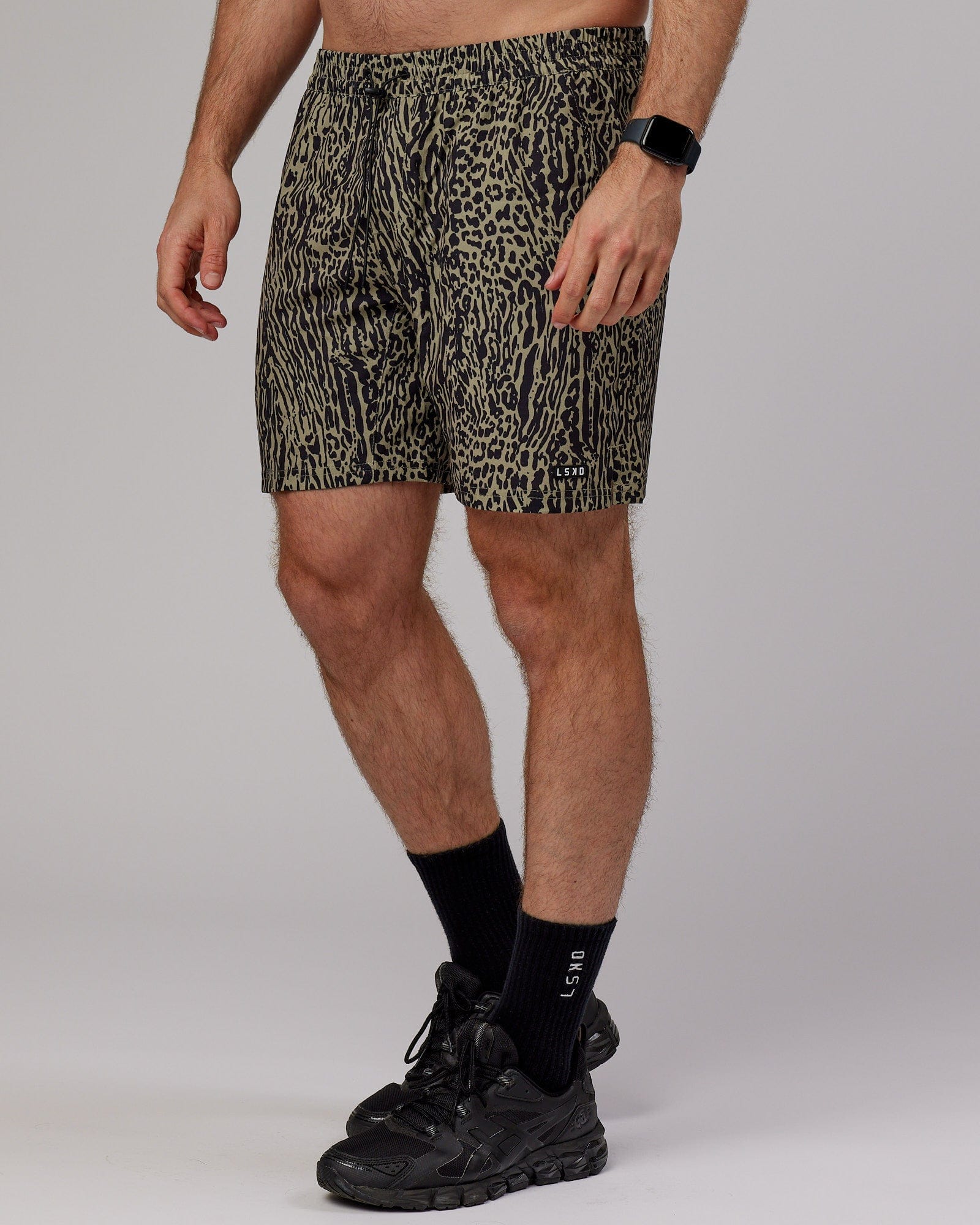 Model wearing Hunter 7" Performance Short - Laurel Oak-Black