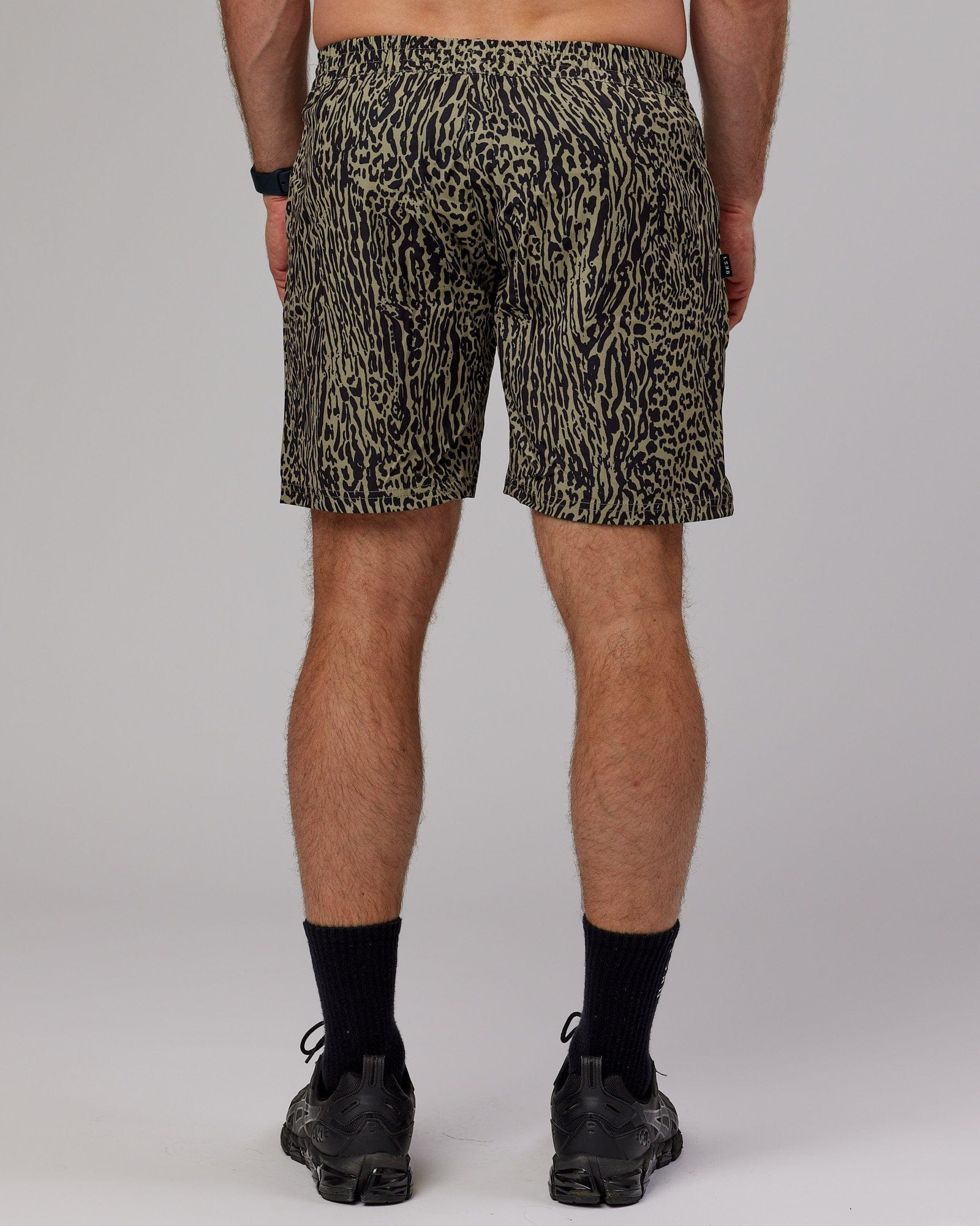 Model wearing Hunter 7" Performance Short - Laurel Oak-Black