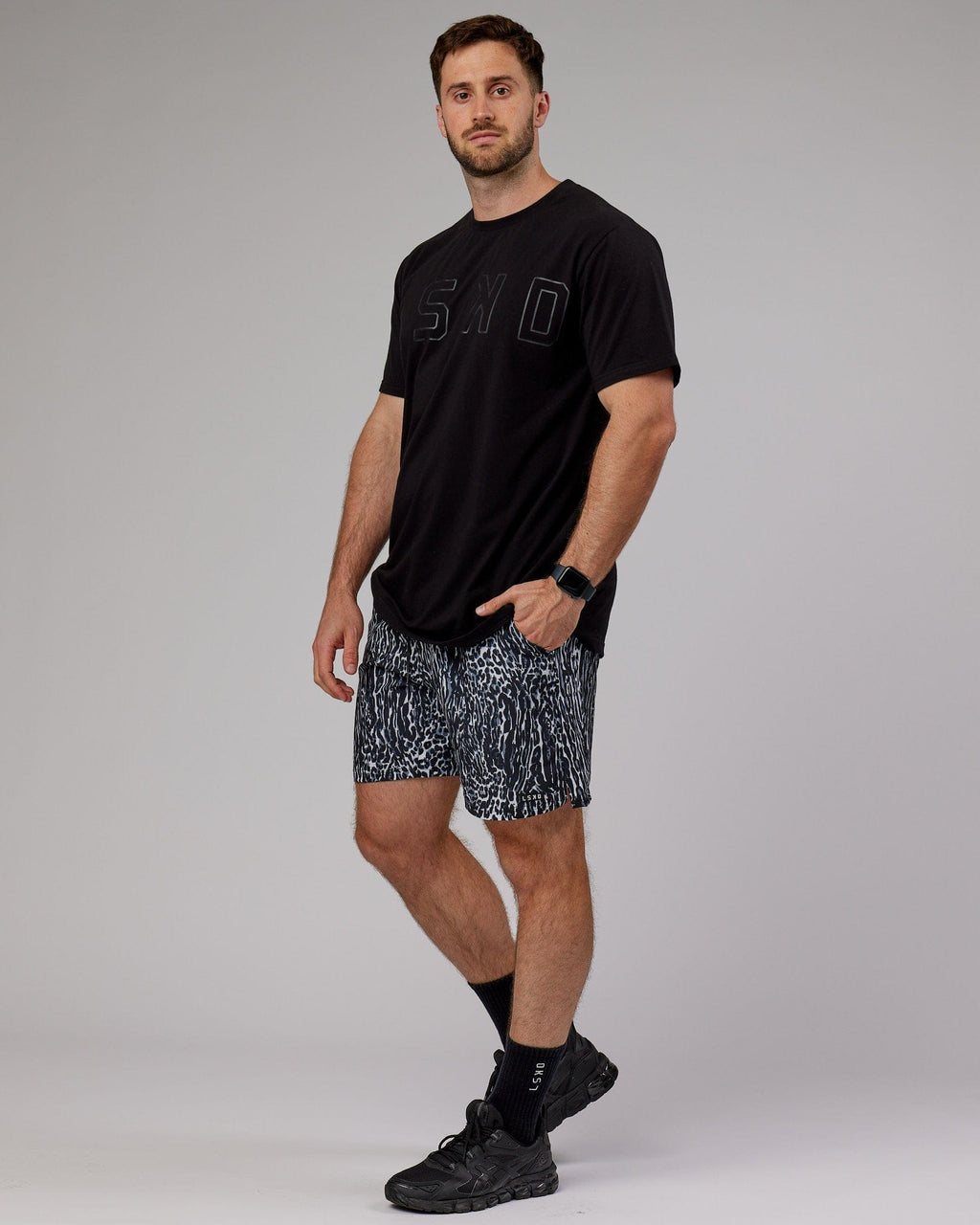 Model wearing Hunter 7" Performance Short - Night Leopard