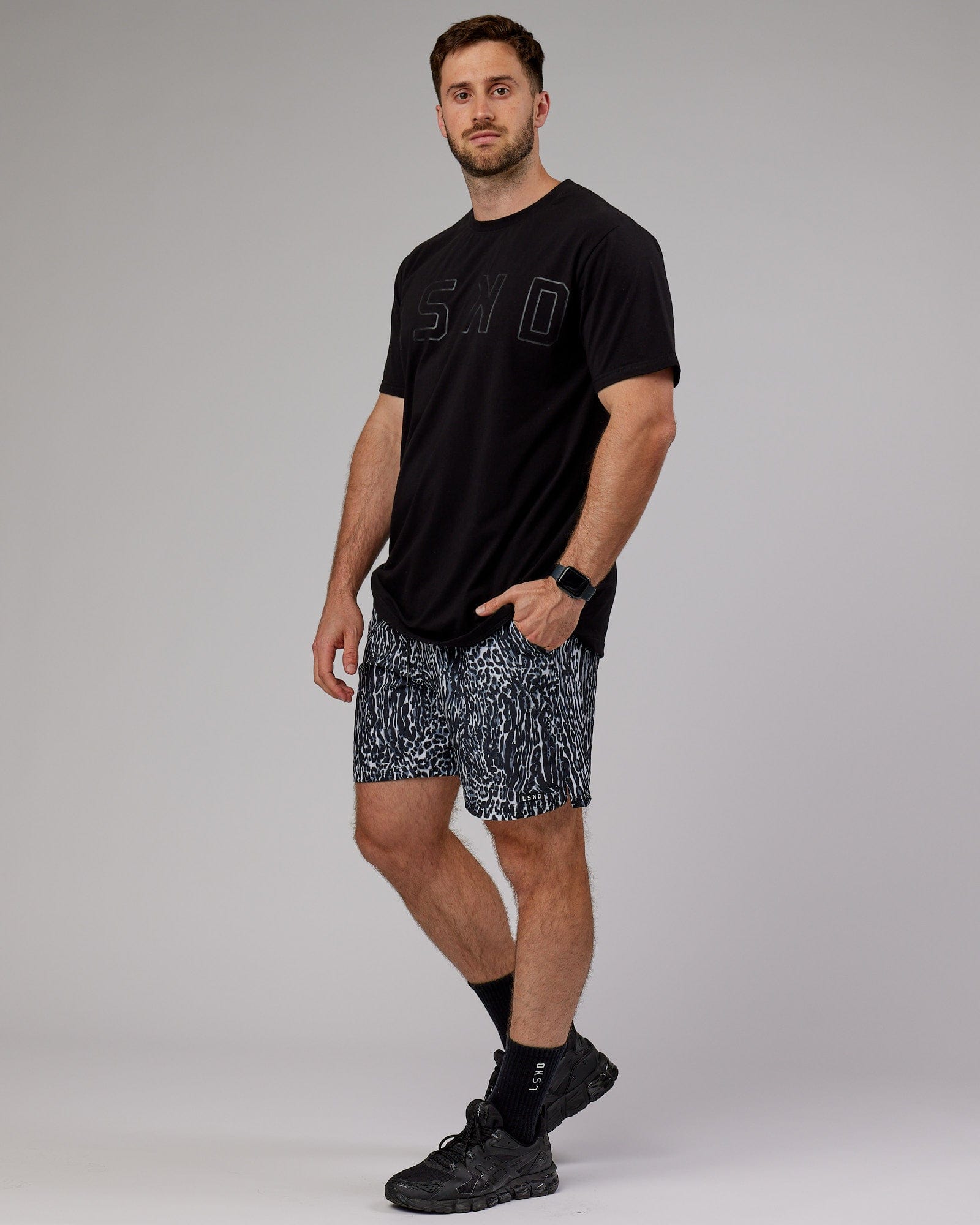 Model wearing Hunter 7" Performance Short - Night Leopard