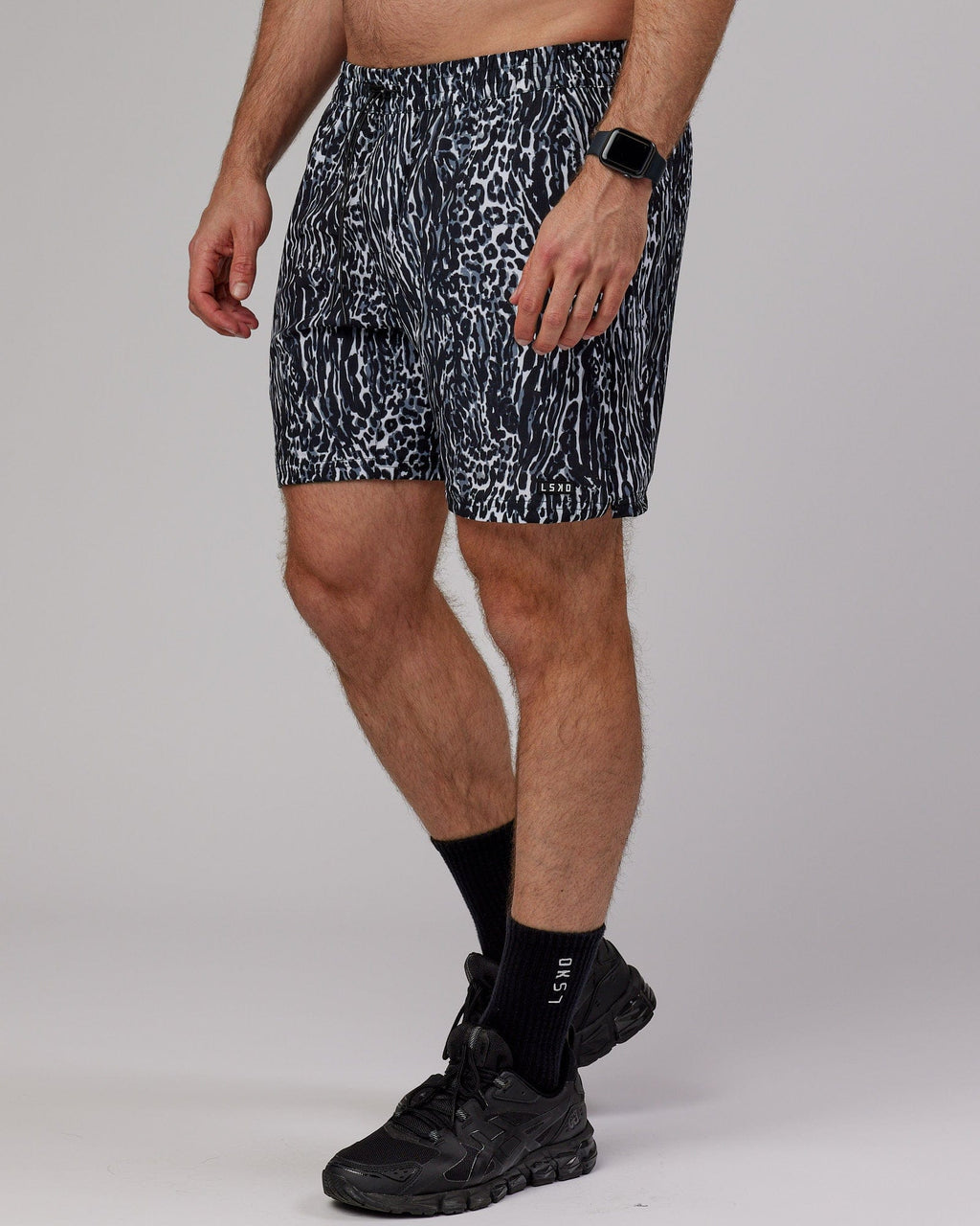 Model wearing Hunter 7" Performance Short - Night Leopard