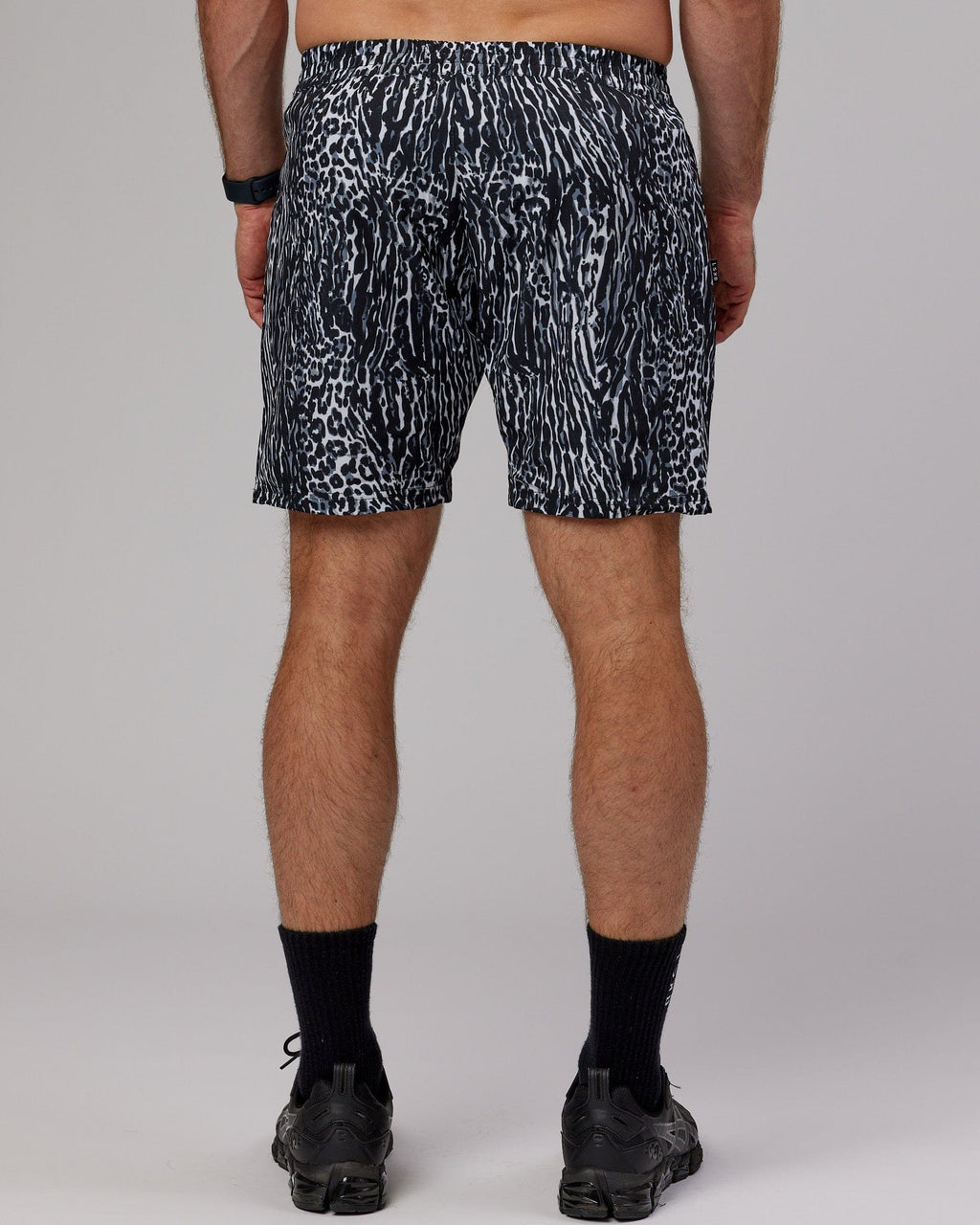 Model wearing Hunter 7" Performance Short - Night Leopard