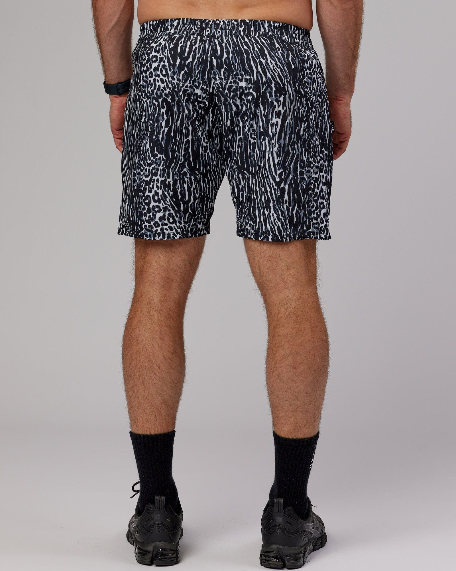 Model wearing Hunter 7" Performance Short - Night Leopard