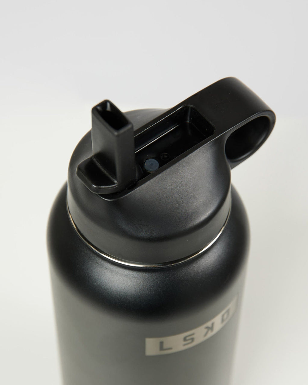 Model wearing Hydrosphere 32oz Insulated Metal Bottle - Black-Black