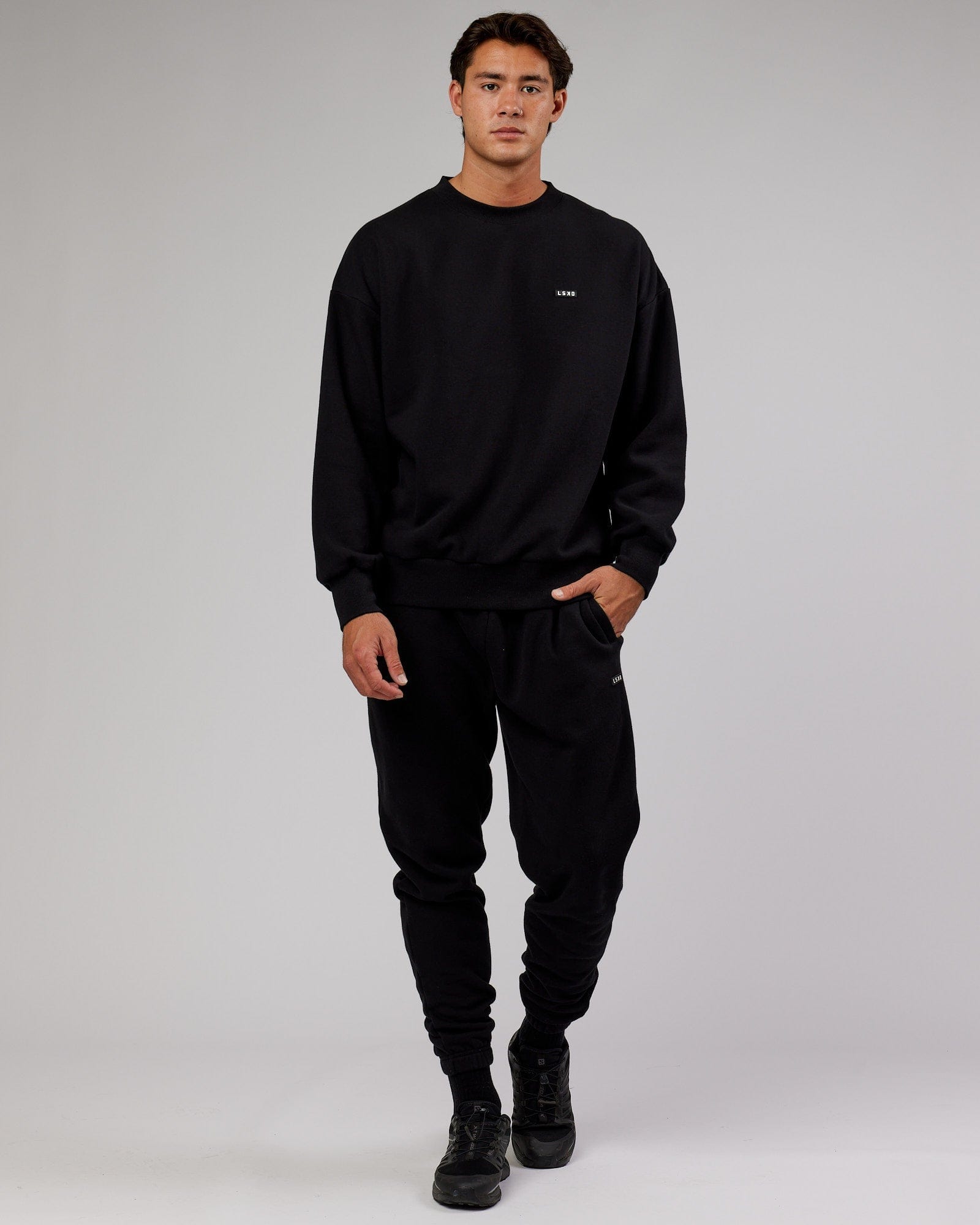 Model wearing Iconic Track Pant - Black