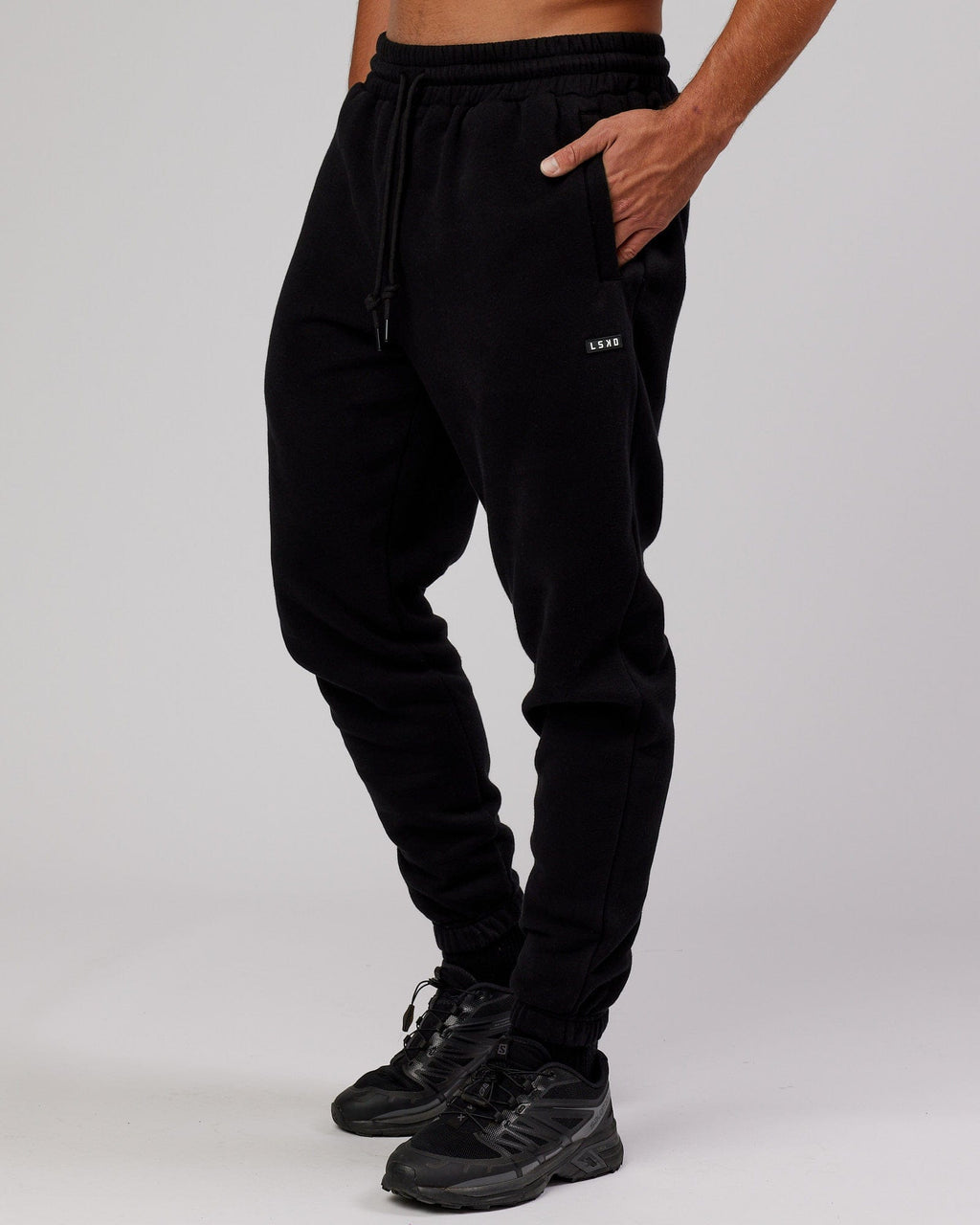 Model wearing Iconic Track Pant - Black