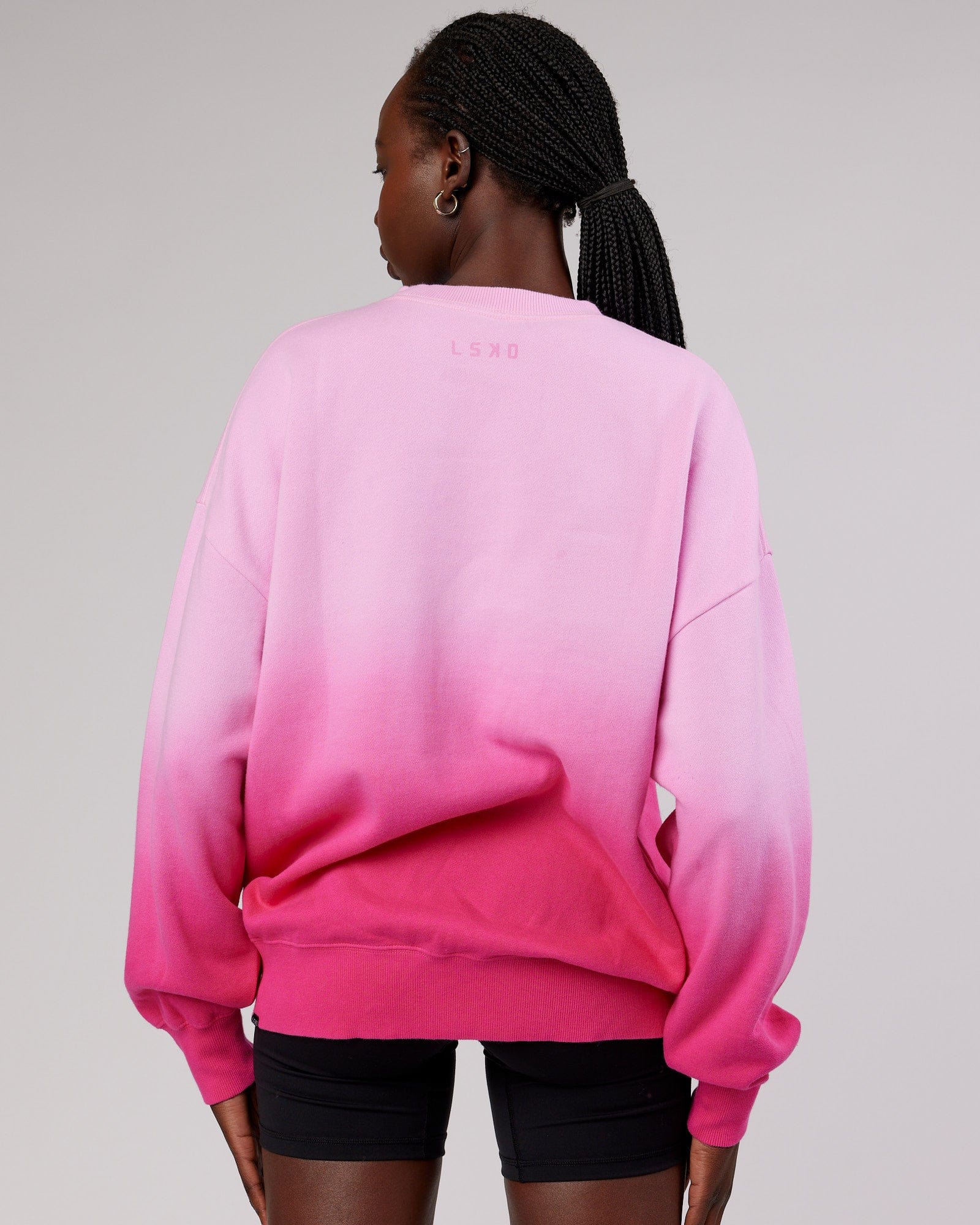 Model wearing Incline Sweater - Magenta