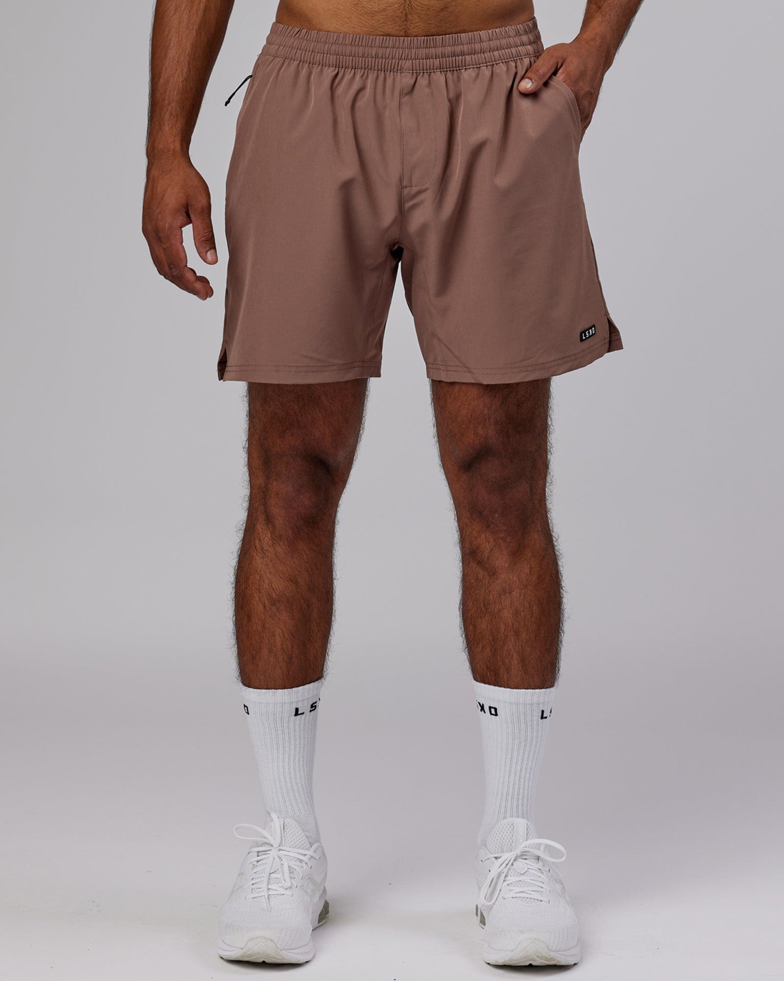 Model wearing Intensity 7'' Performance Short - Deep Taupe