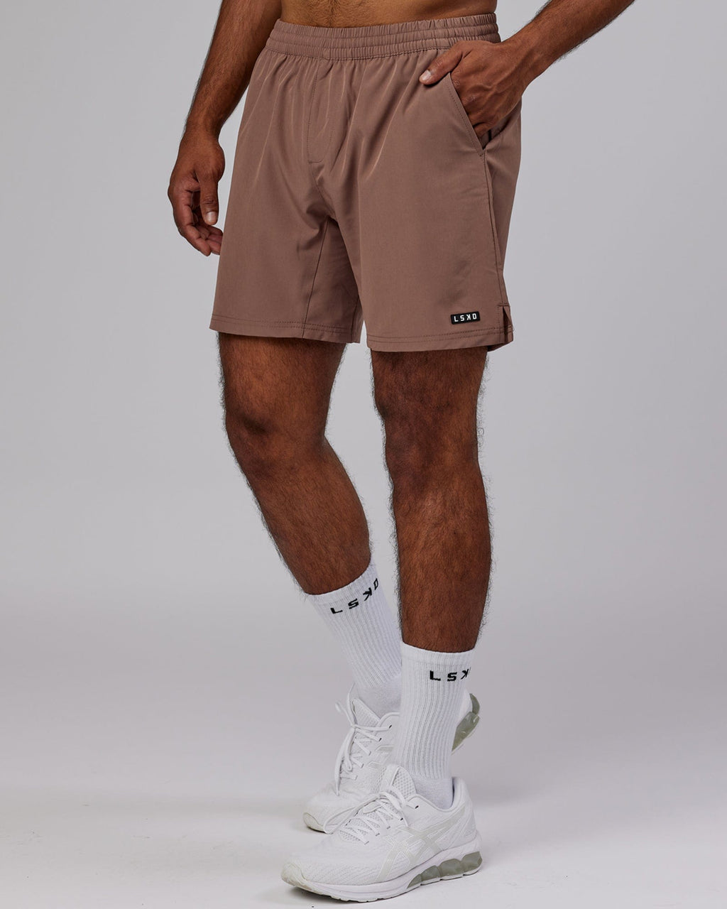 Model wearing Intensity 7'' Performance Short - Deep Taupe