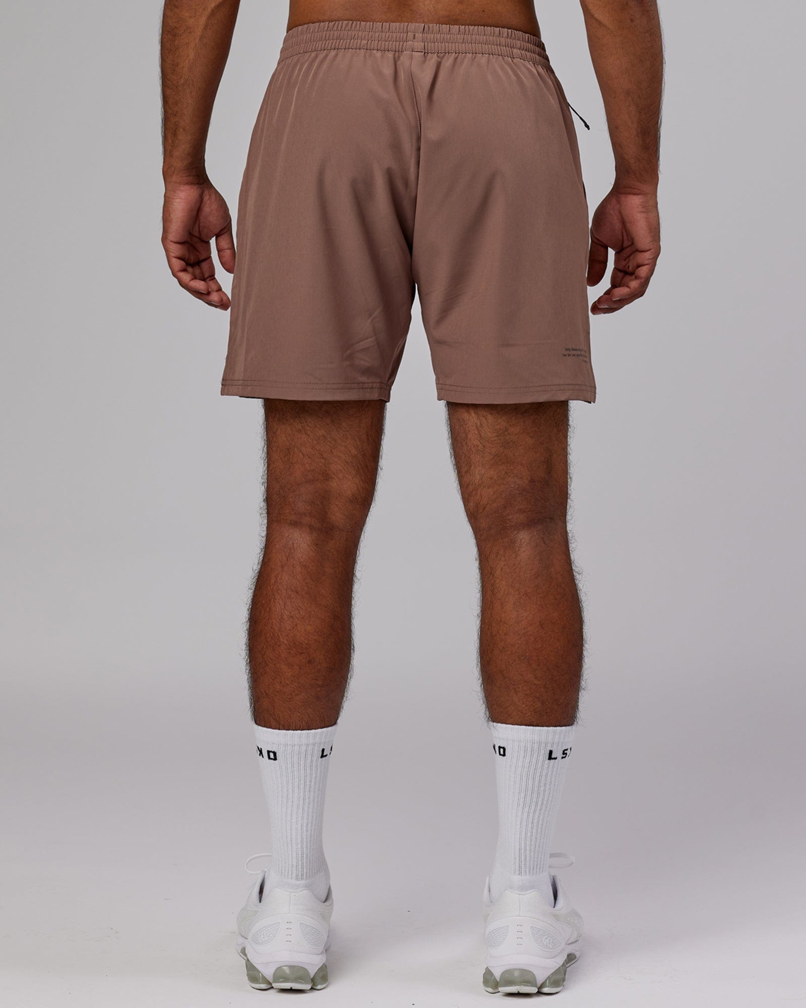 Model wearing Intensity 7'' Performance Short - Deep Taupe