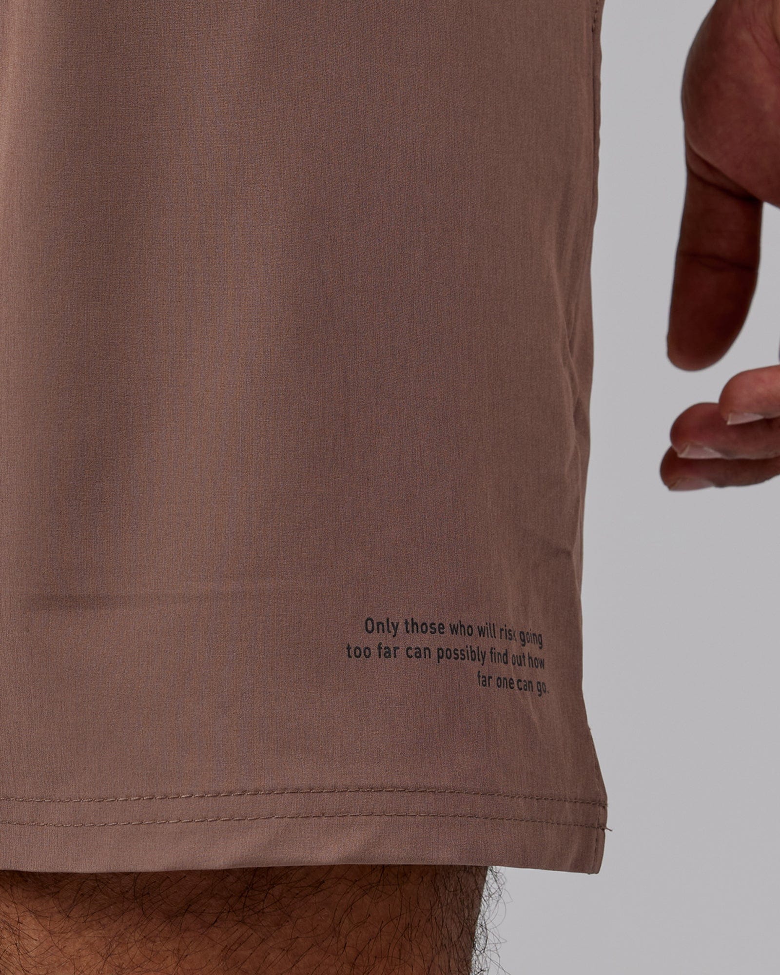 Model wearing Intensity 7'' Performance Short - Deep Taupe