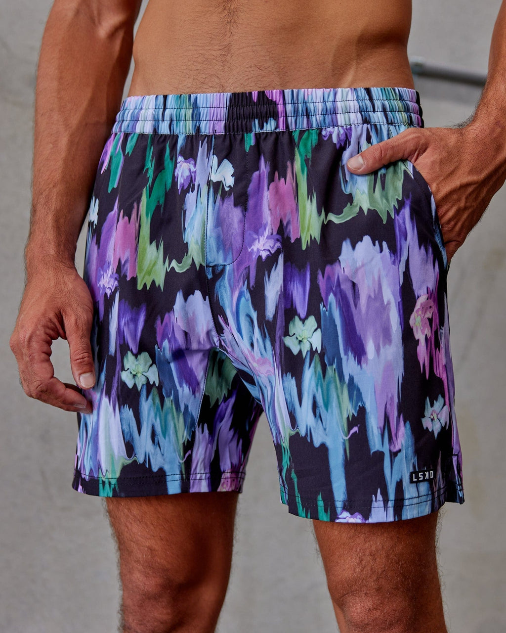 Model wearing Intensity 7'' Performance Short - Hyper Floral Black