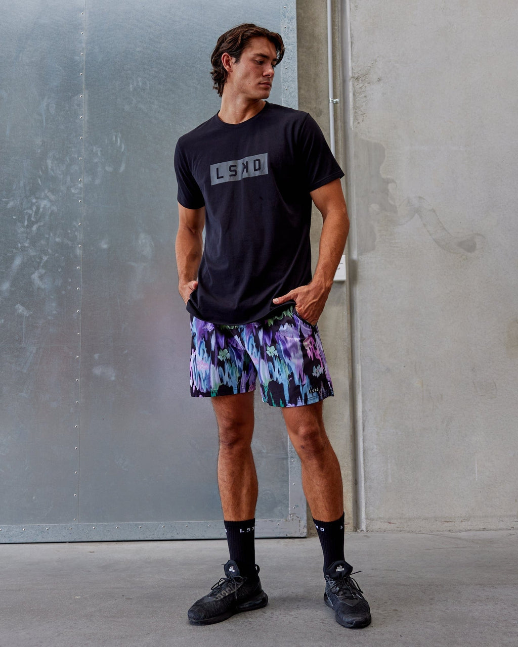 Model wearing Intensity 7'' Performance Short - Hyper Floral Black