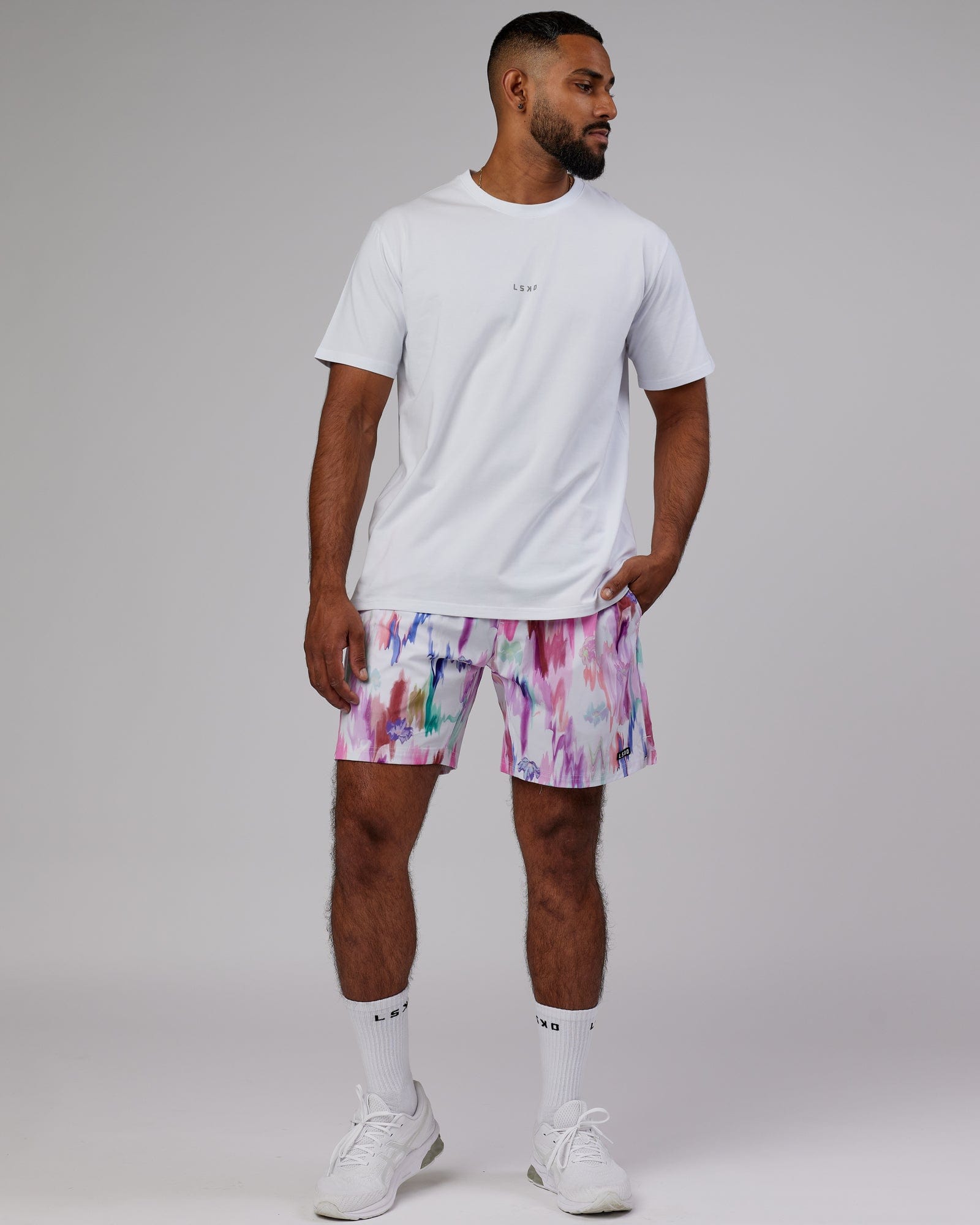 Model wearing Intensity 7'' Performance Short - Hyper Floral White