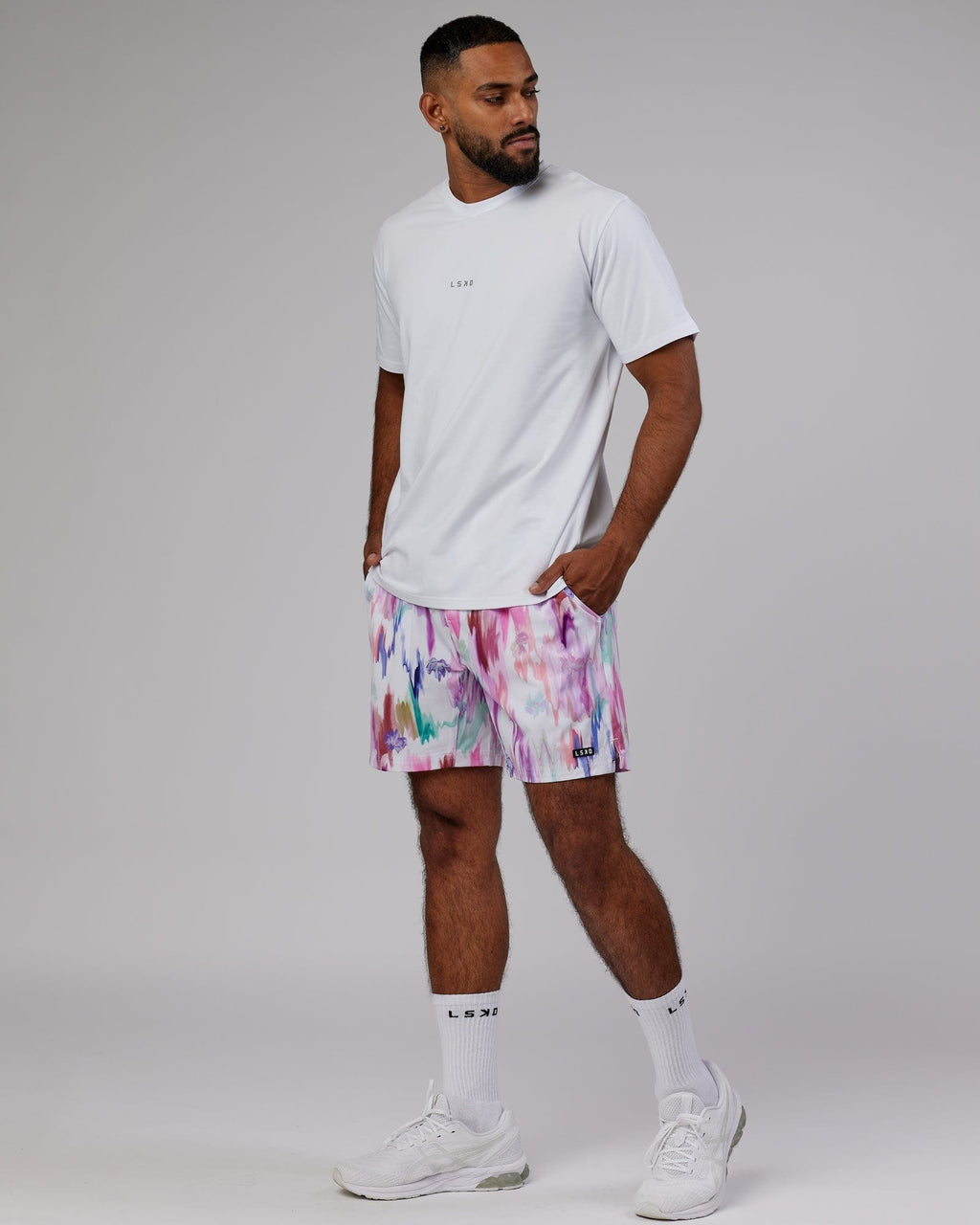 Model wearing Intensity 7'' Performance Short - Hyper Floral White
