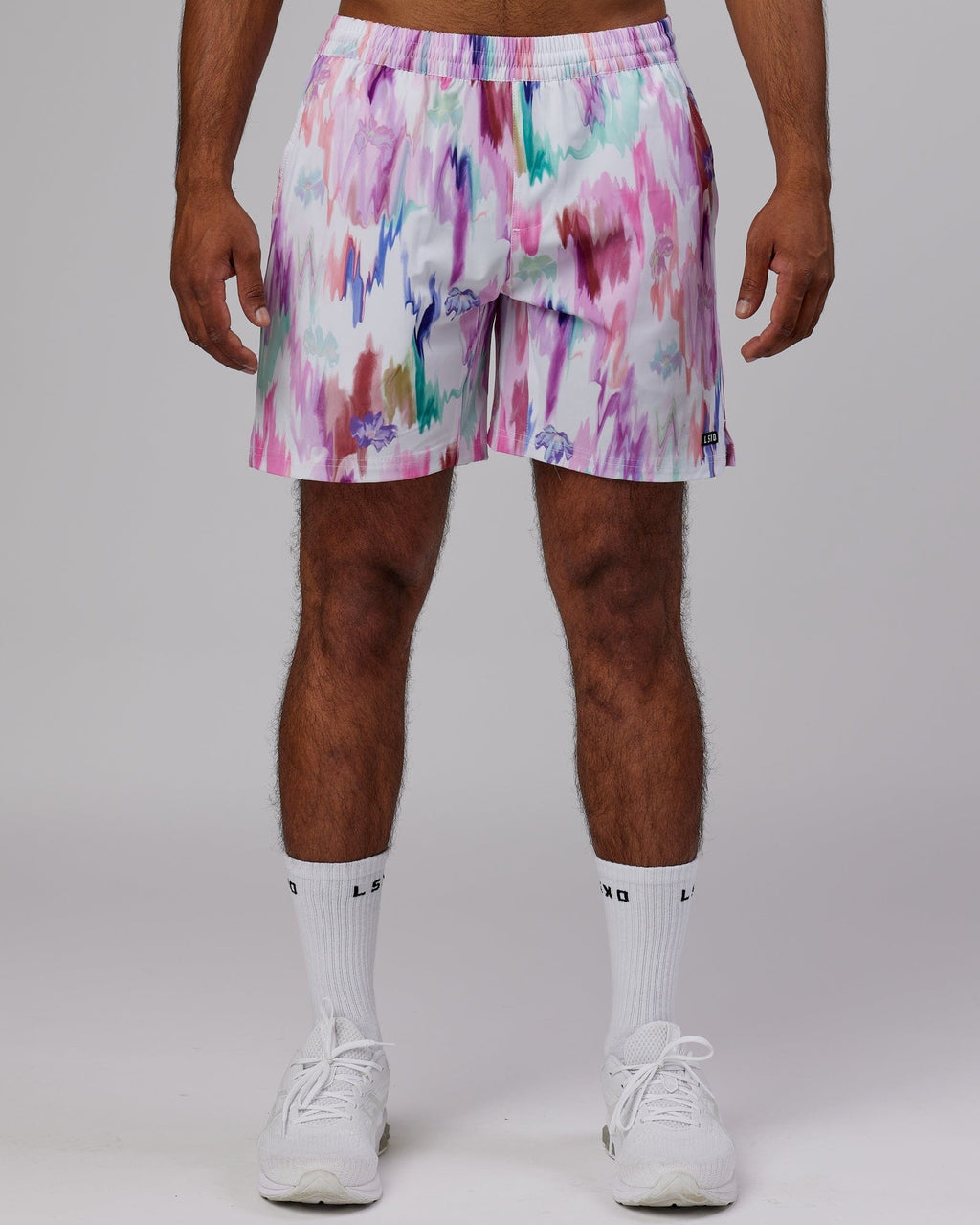 Model wearing Intensity 7'' Performance Short - Hyper Floral White