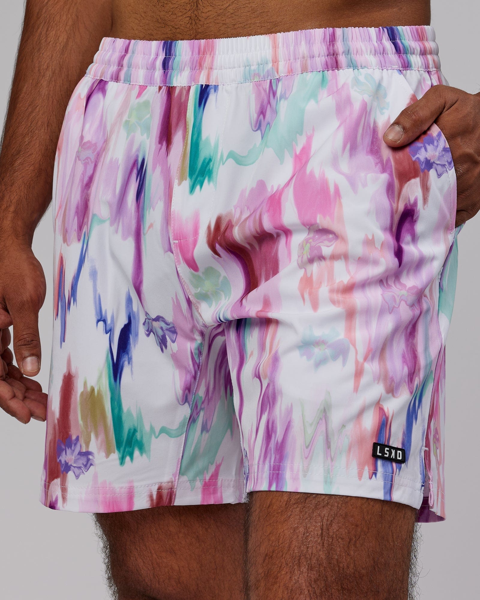 Model wearing Intensity 7'' Performance Short - Hyper Floral White