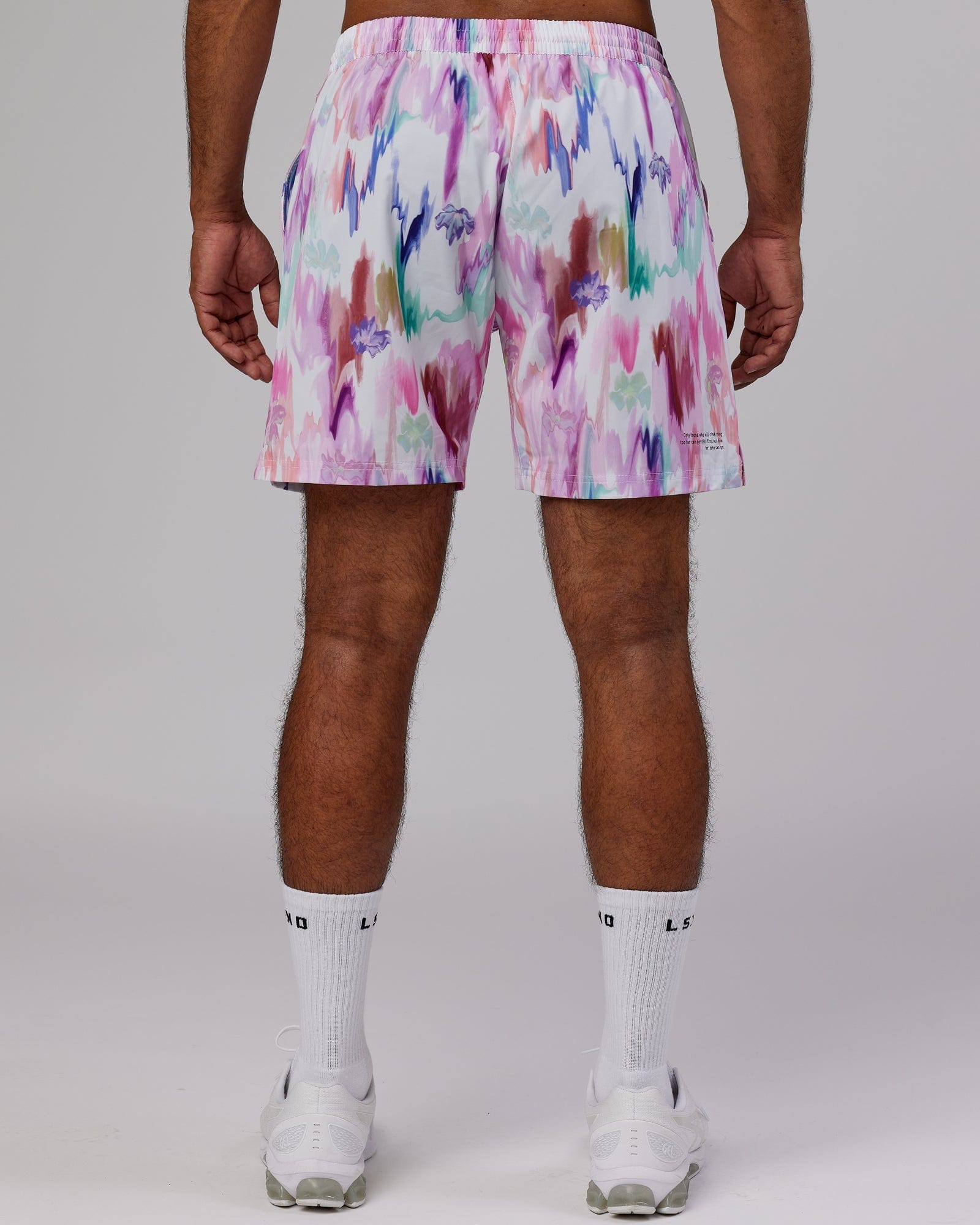Model wearing Intensity 7'' Performance Short - Hyper Floral White