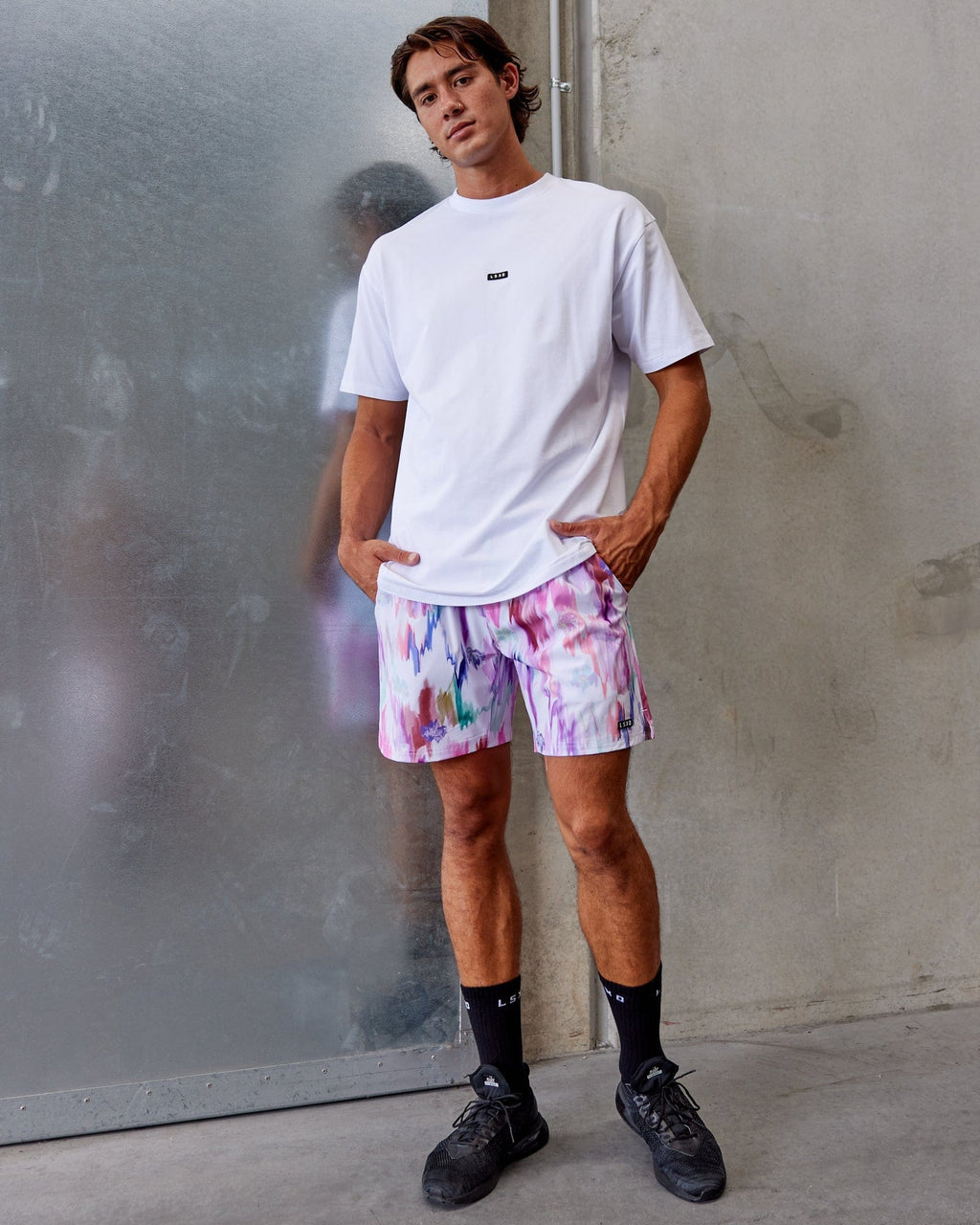 Model wearing Intensity 7'' Performance Short - Hyper Floral White