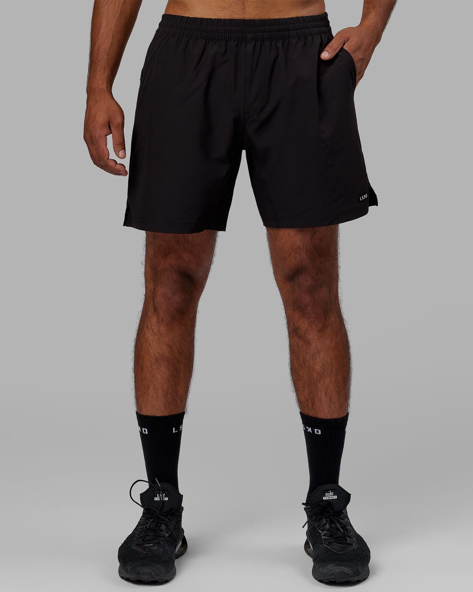 Model wearing Intensity 7" Performance Short - Black