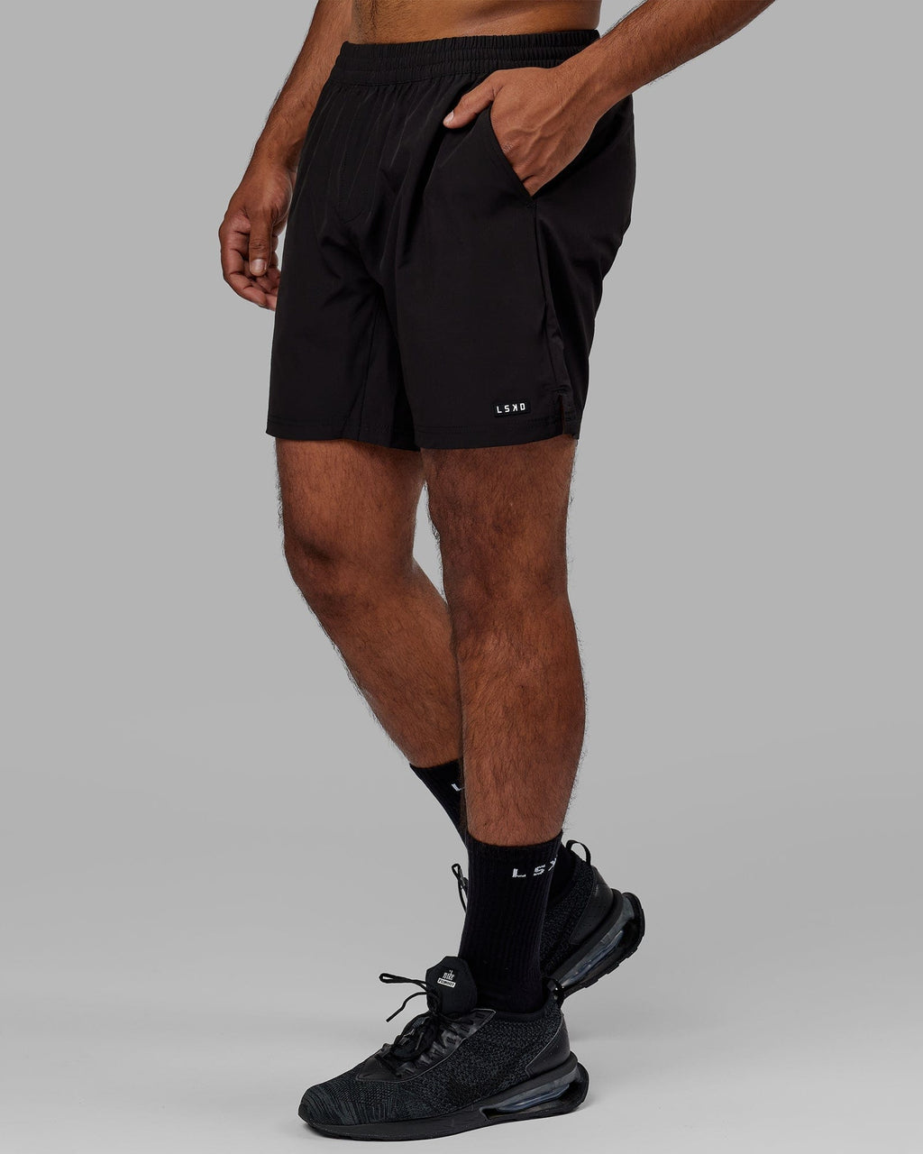 Model wearing Intensity 7" Performance Short - Black